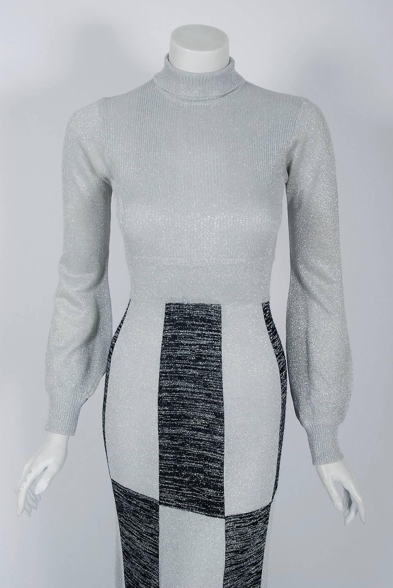 Redefining an entire genre of fashion, the 1970's were seen as Missoni's launch to fame as the boho chic trends coincided with Missoni's trippy and psychedelic patterns. The silver and black op-art graphic knit on this beauty is delightfully soft