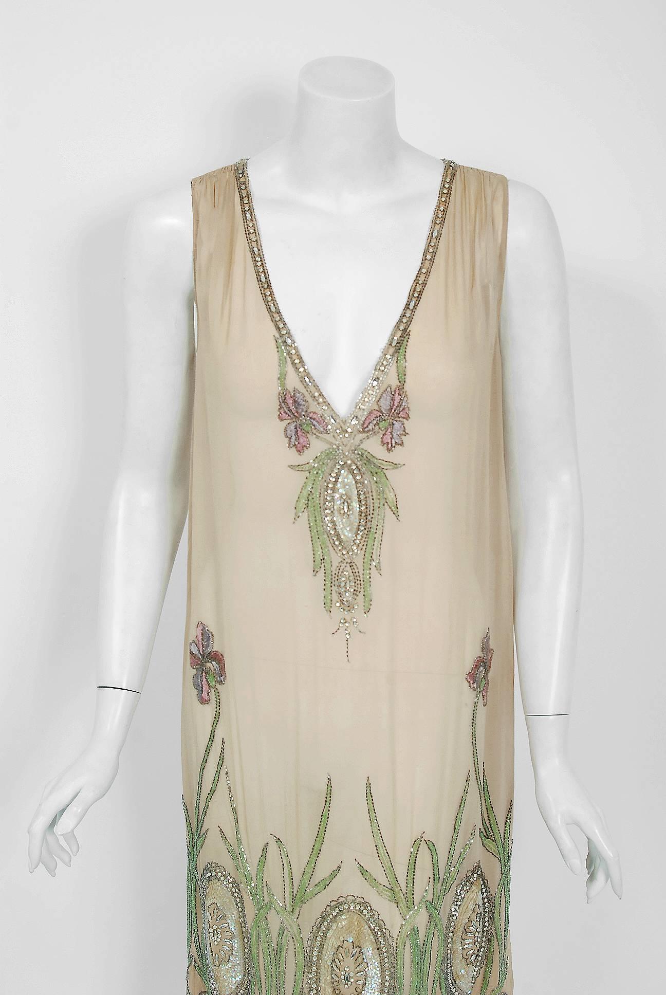 There are lots of lovely 1920's garments still around, but every once in a while I come across one that sets my heart a flutter! This is an extraordinarily beautiful and exceptional French couture museum quality nude silk-chiffon dance dress. The