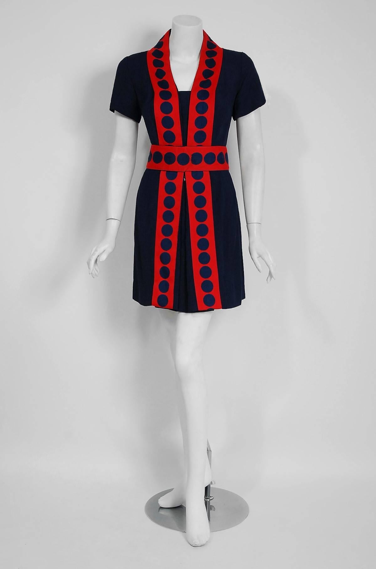 Truly a wonderful and unique space-age designer dress by Richard Frontman. I think this is one of the best examples of 1960's graphic mod fashion I have seen in a long time. The design was obviously inspired by Courreges and Cardin who were the