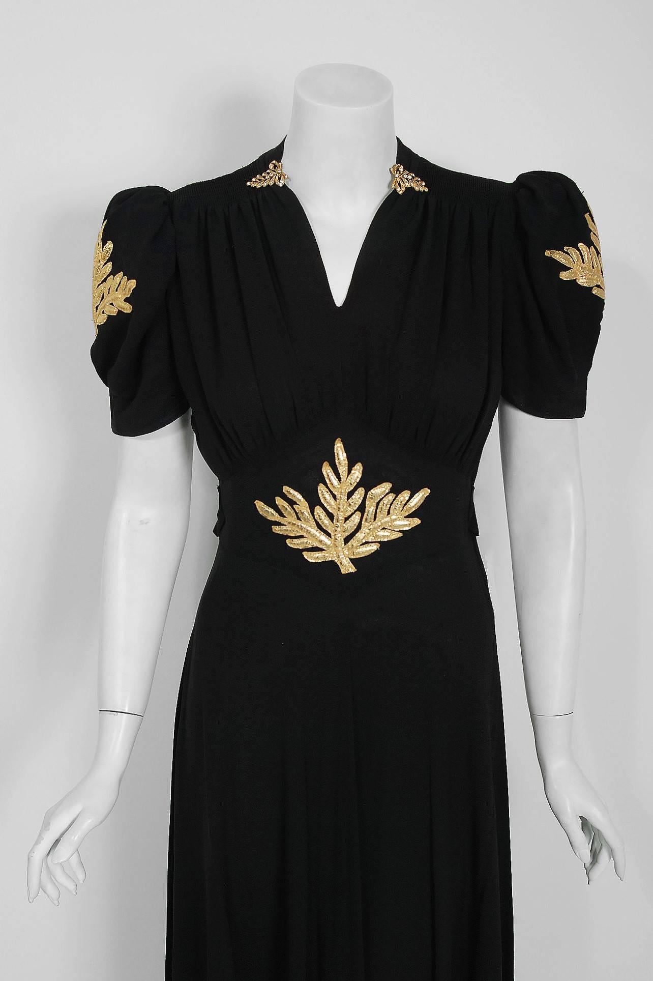 1930's Seductive Metallic-Gold Appliqued Black Crepe Puff Sleeve Bias-Cut Gown In Excellent Condition In Beverly Hills, CA