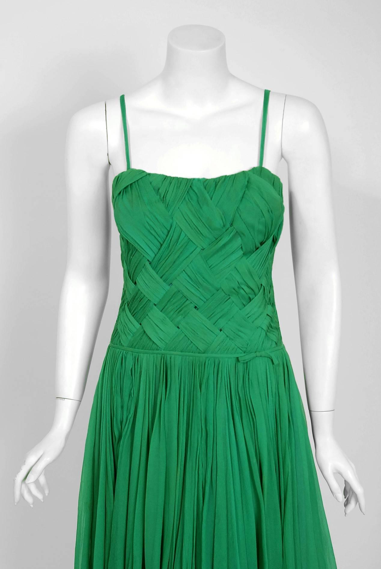 This breathtaking early 1960's Carven cocktail full-skirted cocktail dress, in the most beautiful silhouette, is pure couture perfection. Carven’s exquisite taste and enviable lifestyle became the background of her designs and a means of promotion.