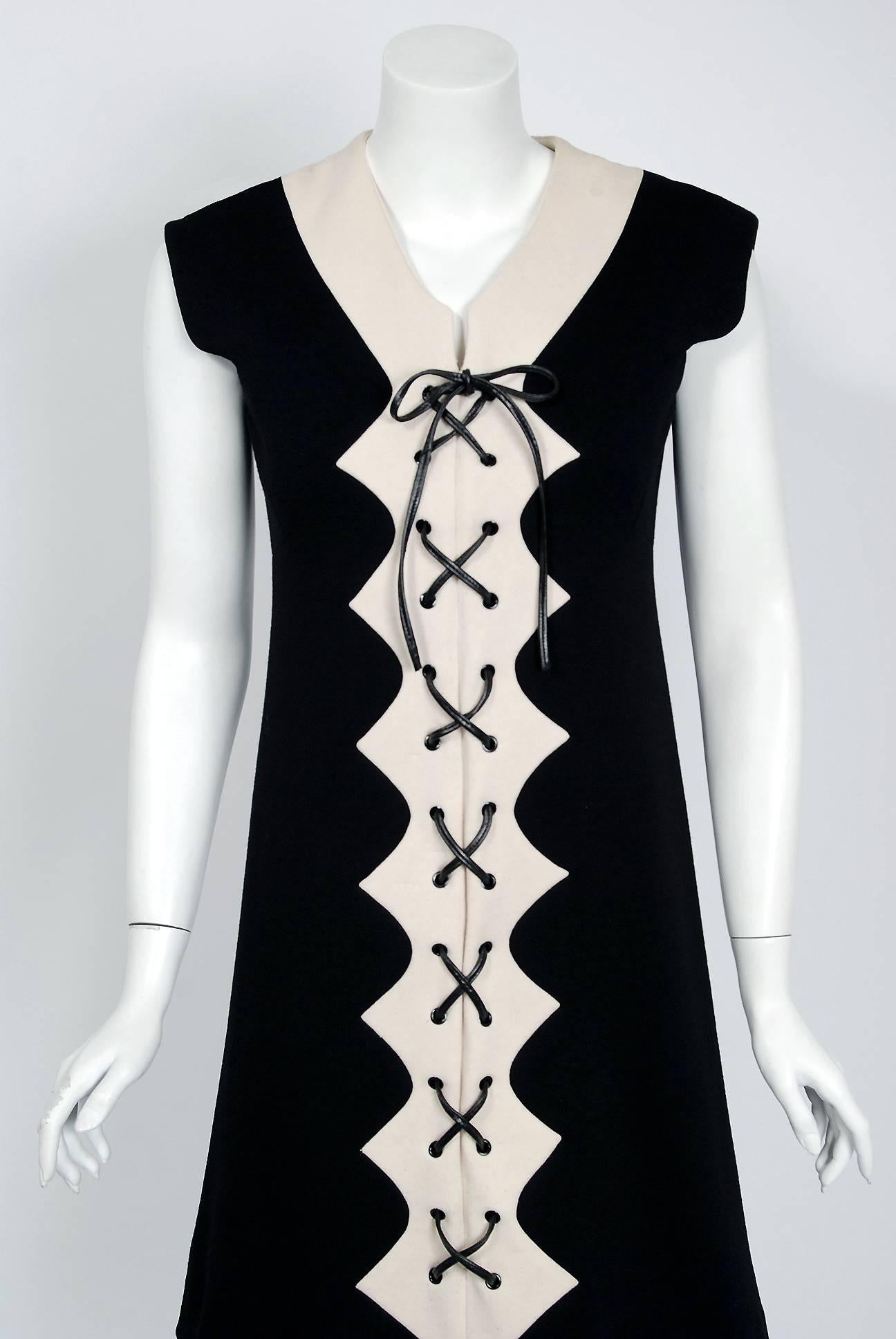 Spectacular Pierre Cardin black and white block-color wool dress from his 1968 collection. In 1951 Cardin opened his own couture house and by 1957, he started a ready-to-wear line; a bold move for a French couturier at the time. The look most