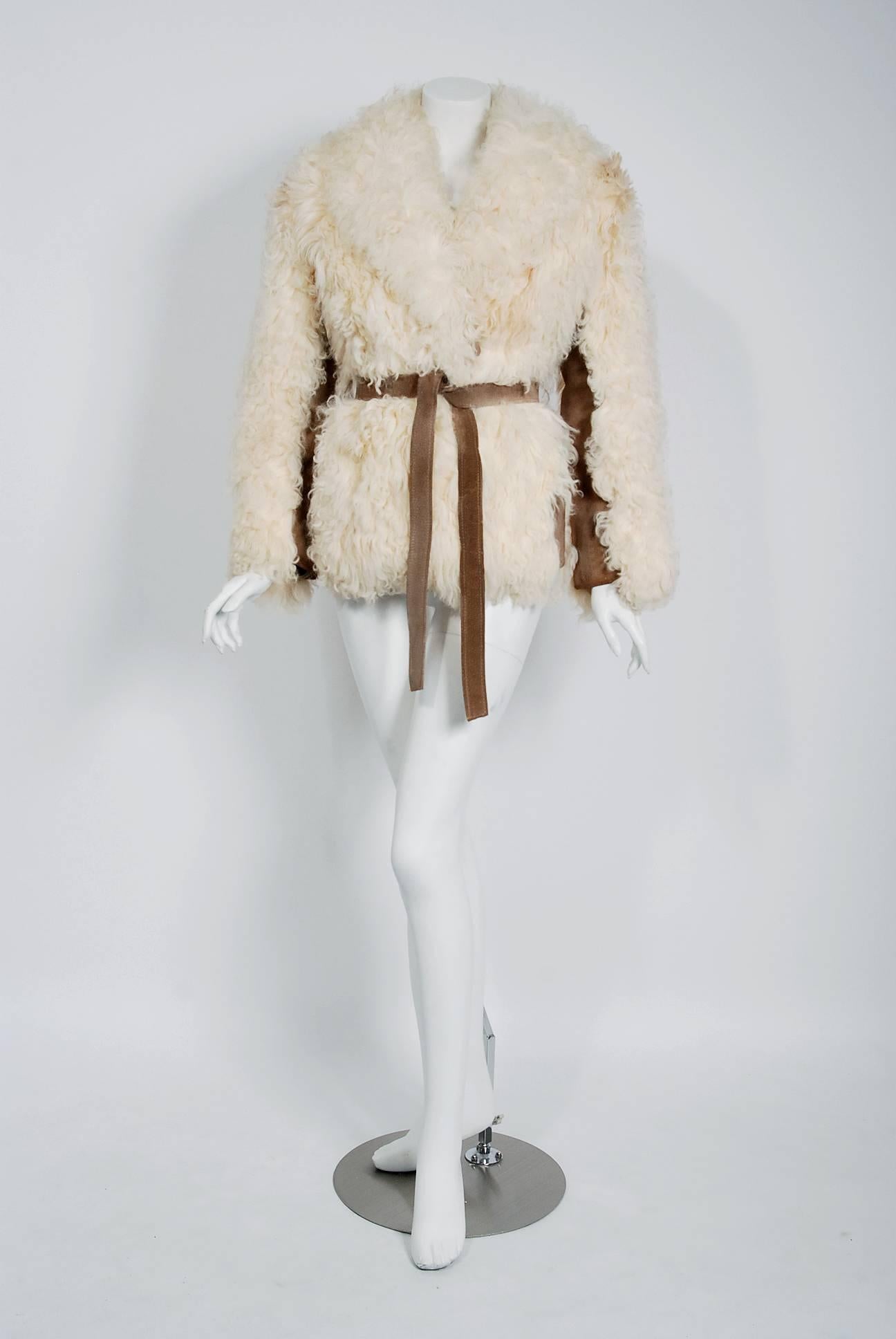 This stunning 1970's York Furrier Mongolian genuine-fur finely shaped jacket will be your statement piece all season long. It has that perfect touch of curl and a natural difference in colors, ranging from ivory to taupe. I adore the over-sized