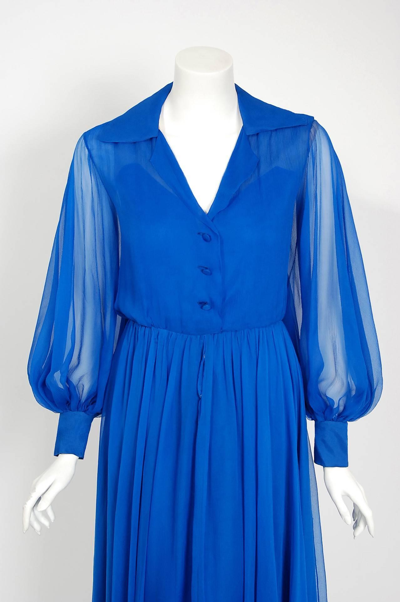 A gorgeous Christian Dior sapphire blue silk chiffon show-stopper dating back to their 1973 collection.  When the talented Marc Bohan took over as head designer in 1960, he continued the Dior tradition of elegant design and this beautiful dress is a
