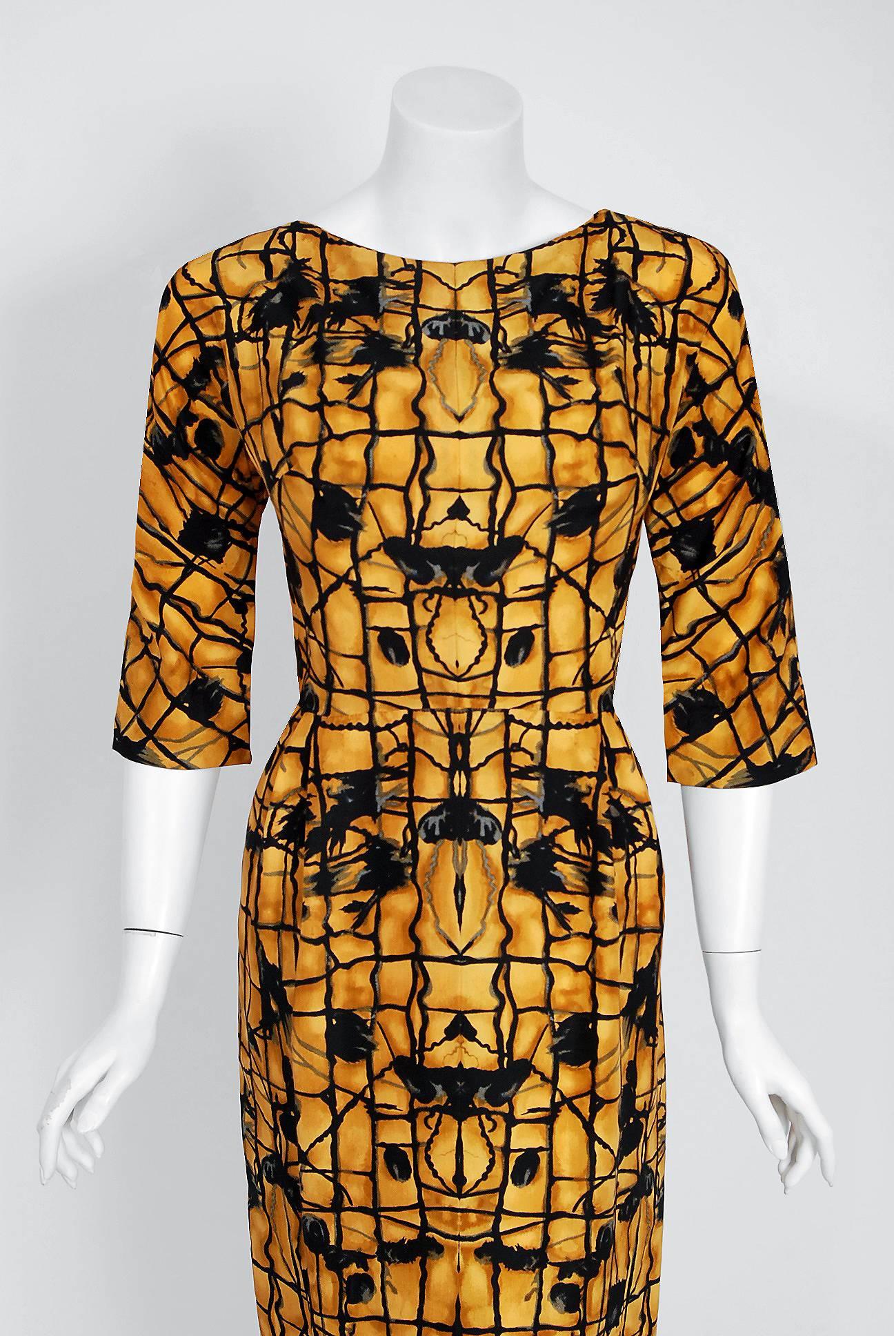 This breathtaking marigold-yellow and black graphic print cocktail, dating back to the mid 1950's, is a perfect example of Irene Lentz's genuis. Her pattern is so strikingly modern, it almost reminds me of an Alexander McQueen creation. The elegant