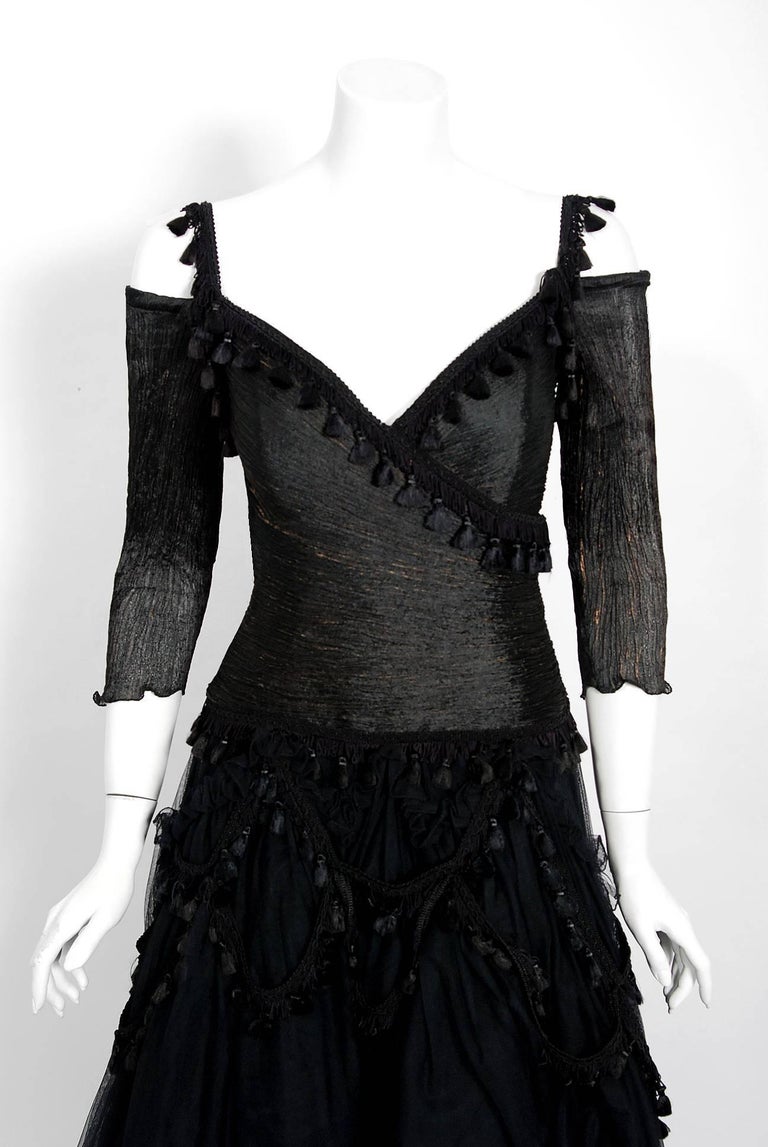 Brreathtaking Zandra Rhodes black gothic evening gown dating back to the early 1990's. Zandra Rhodes was one of the British designers who put London at the forefront of the international fashion scene. Her designs are considered creative statements,