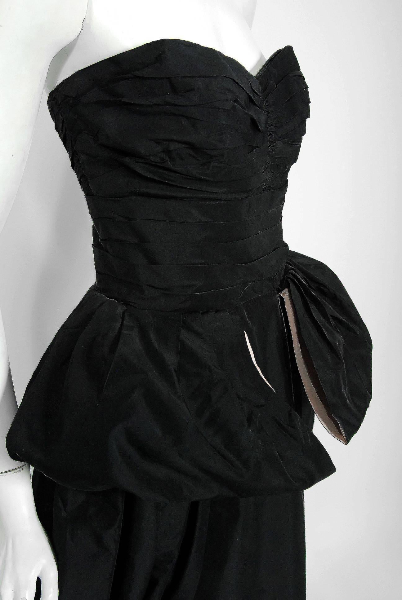 A breathtaking Clifton Wilhite of Dallas designer black and pink taffeta evening dress from the Old Hollywood era of glamour. The bodice has a gorgeous ruched sweetheart plunge with seductive boned strapless. I adore that  hourglass nipped waist