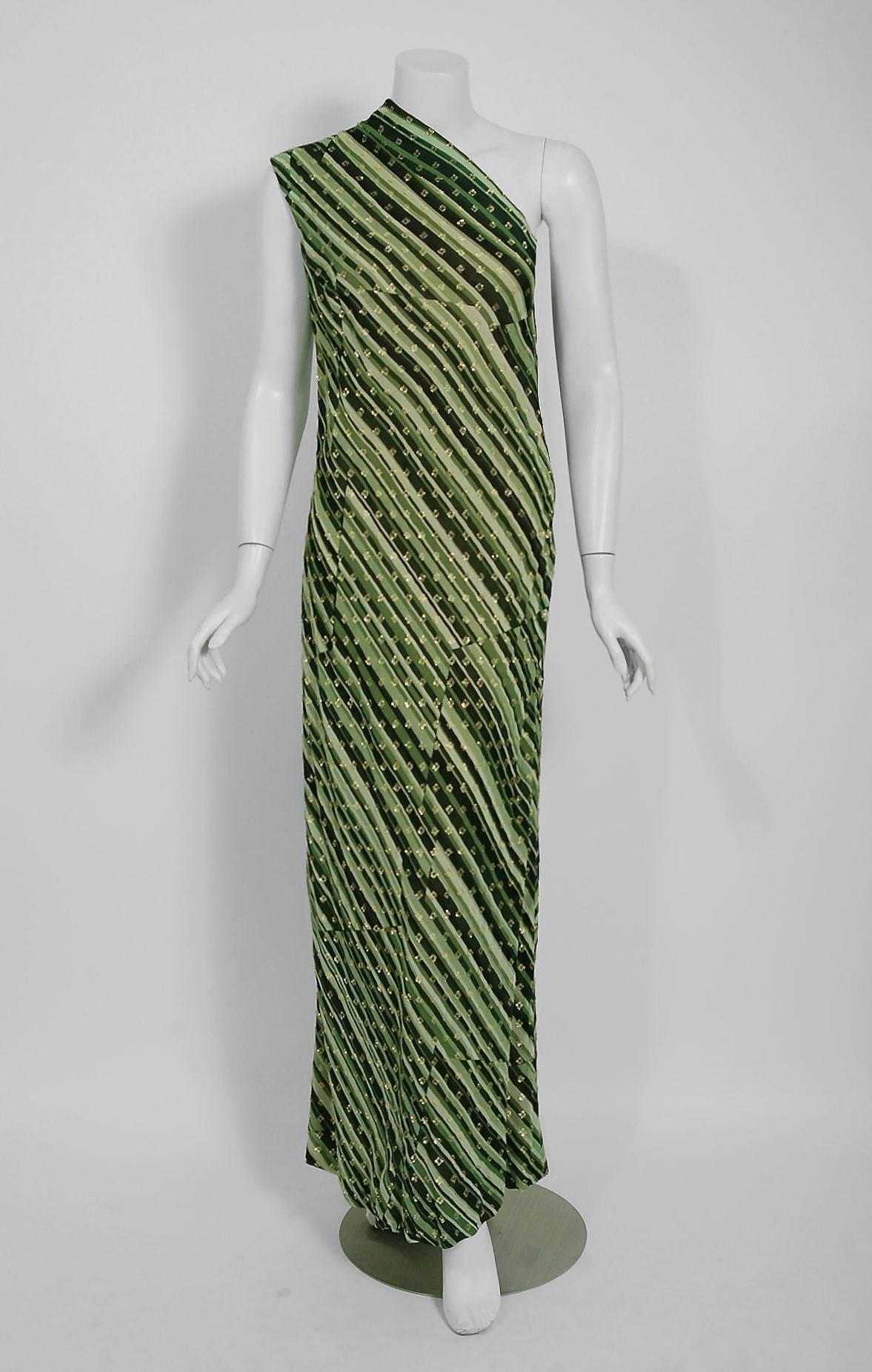 Seductive Pauline Trigere designer metallic stripe bias-cut gown dating back to the early 1970's During this time period, Pauline Trigère's name was part of the glamorous excess in Hollywood fashion. Her exquisite tailoring and feminine fitting