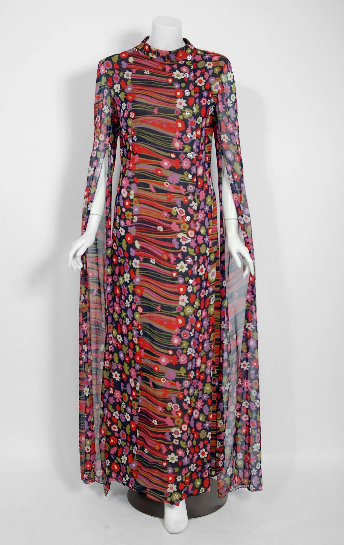 Breathtaking Pauline Trigère designer abstract floral print maxi-length dress dating back to the late 1960's. During this time period, Trigère's name was part of the glamorous excess in Hollywood fashion. Her exquisite tailoring and feminine