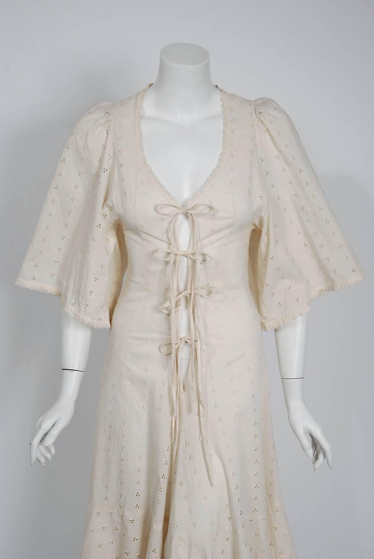 If you were an “It Girl” in London during the 1960's and 1970's, Biba is where you would have shopped. This sensational creme sheer-semi eyelet sundress is a perfect example of the brand's genius. It is a soft cotton with all the classic hallmarks