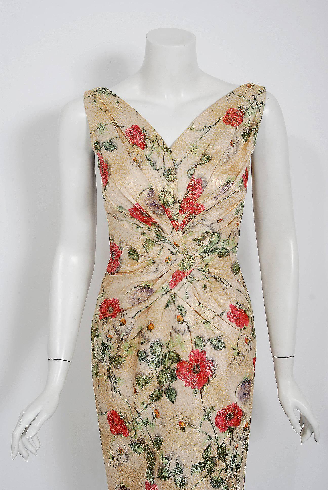 An alluring Ceil Chapman cocktail dress in the most stunning watercolor floral silk-brocade! The metallic shimmer adds a perfect amount of sparkle to this seductive treasure.  I adore the low-cut plunge, heavily-gathered sleeveless bodice. This