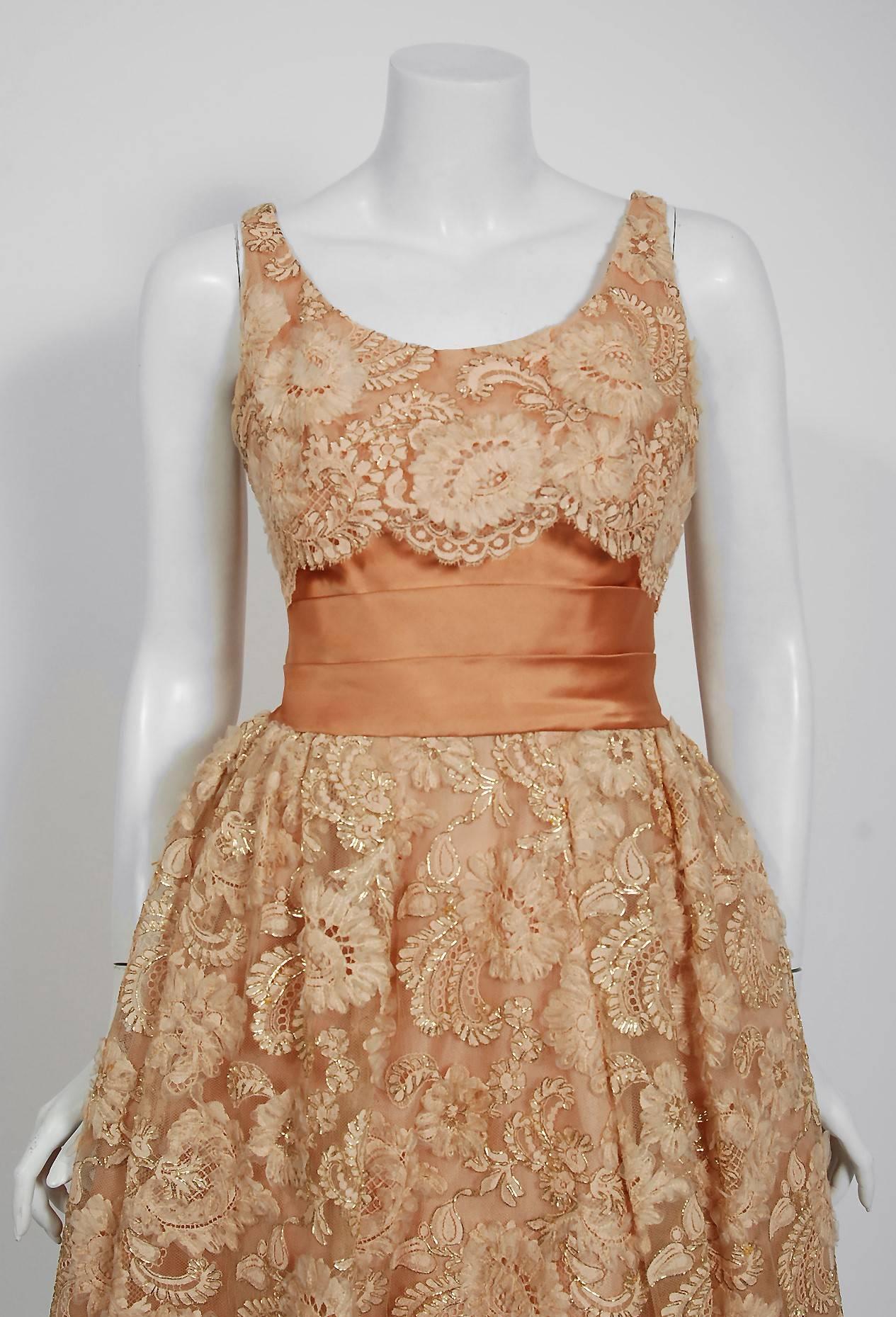 Breathtaking and incredibly chic Rudolf couture designer golden peach party dress dating back to the mid 1950's. The company, started by Max Cory Rudolf, was an upscale boutique in New York City that catered to very prestigious and wealthy