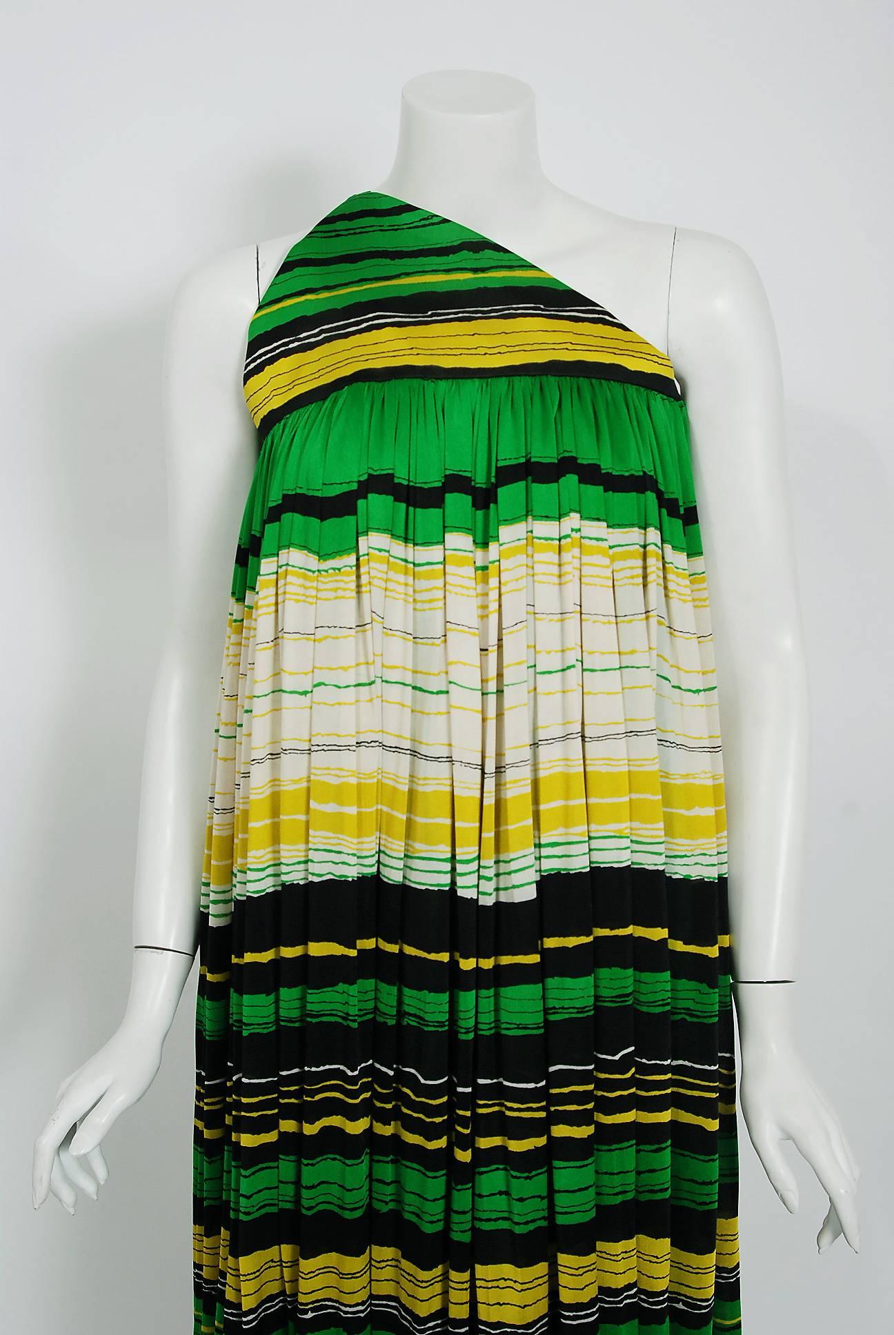 Gorgeous Geoffrey Beene green, yellow and black striped silk-jersey dress dating back to his 1966 collection. The same garment, in a pink shade, was famously worn by Sharon Tate. Geoffrey Beene made strong impressions with his courteous manner as