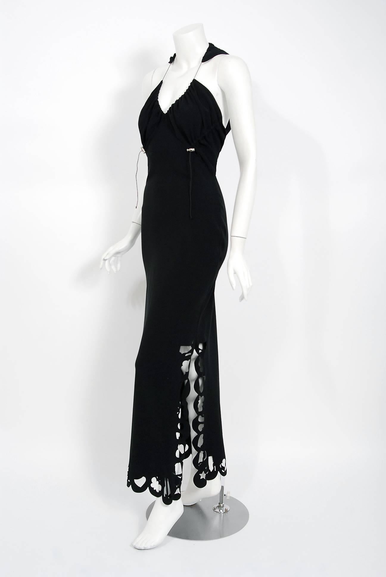 Breathtaking John Galliano black silk laser-cut dress dating back to his 2002 Paris runway collection. This gorgeous garment is new old stock with original $2,520.00 Neiman Marcus price tag. John Galliano is widely considered one of the most