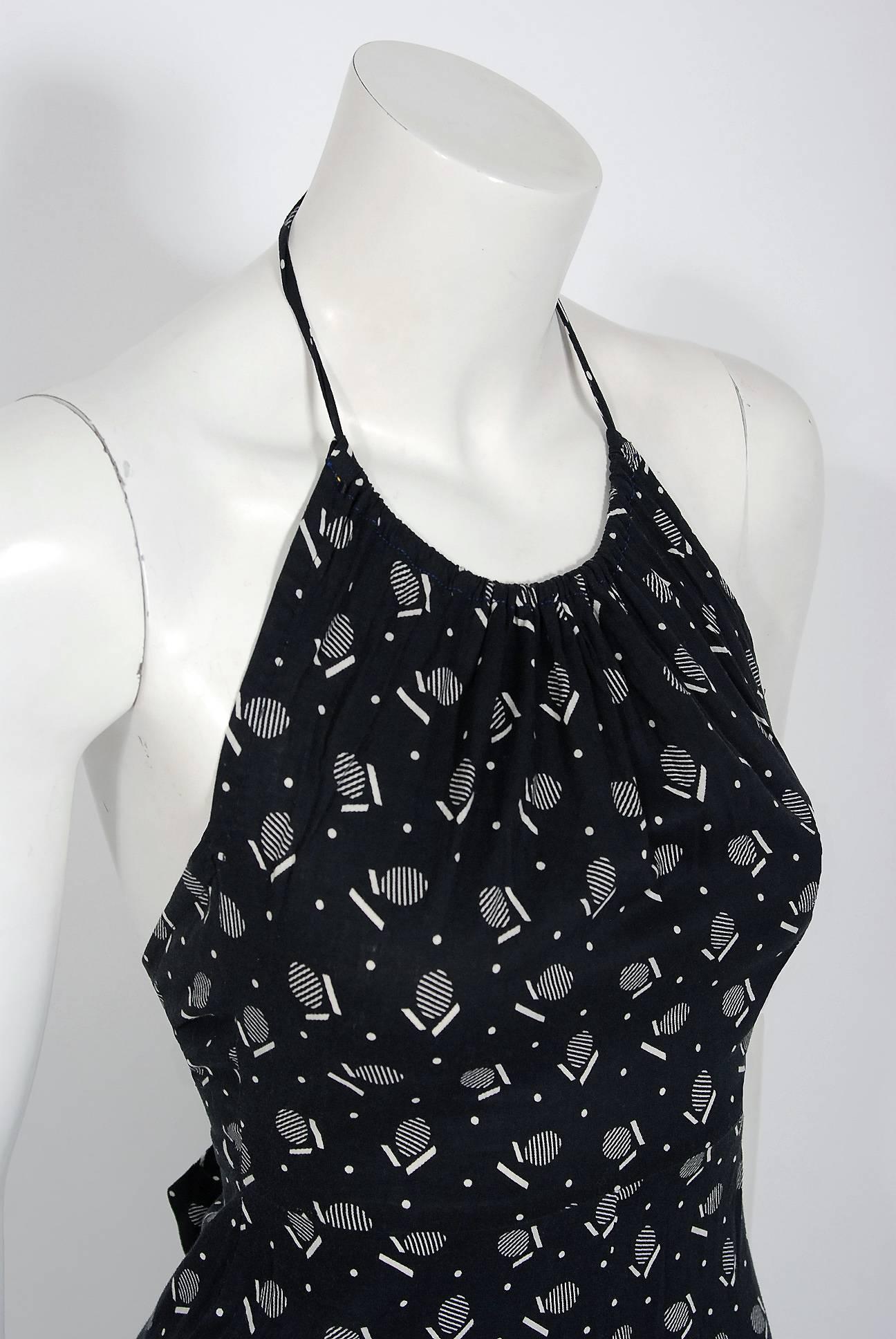 If you were an “It Girl” in London during the 1960's and 1970's, Biba is where you would have shopped. This beautiful black and white deco dots print sundress is a perfect example of the brand's genius. It is an easy-to-wear light weight cotton with
