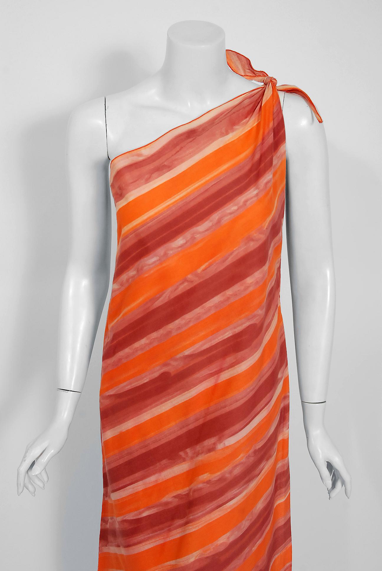 Stunning Paco Rabanne designer orange ombré cotton ensemble dating back to the mid 1970's. Paco Rabanne's architectural background led him to use interesting techniques when he created his garments. These fashion experiments were important in