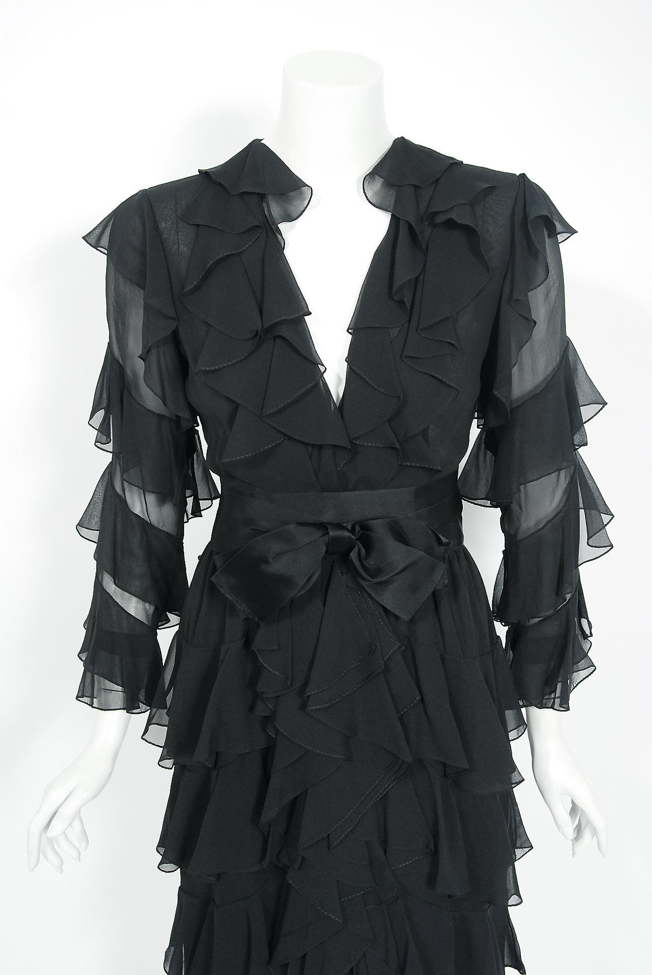 Gorgeous Bill Blass Couture black semi-sheer silk chiffon cocktail dating back to his 1973 collection. Building upon the innovations of European designers such as Coco Chanel, Blass made clothes that allowed women a modern sense of ease. He made