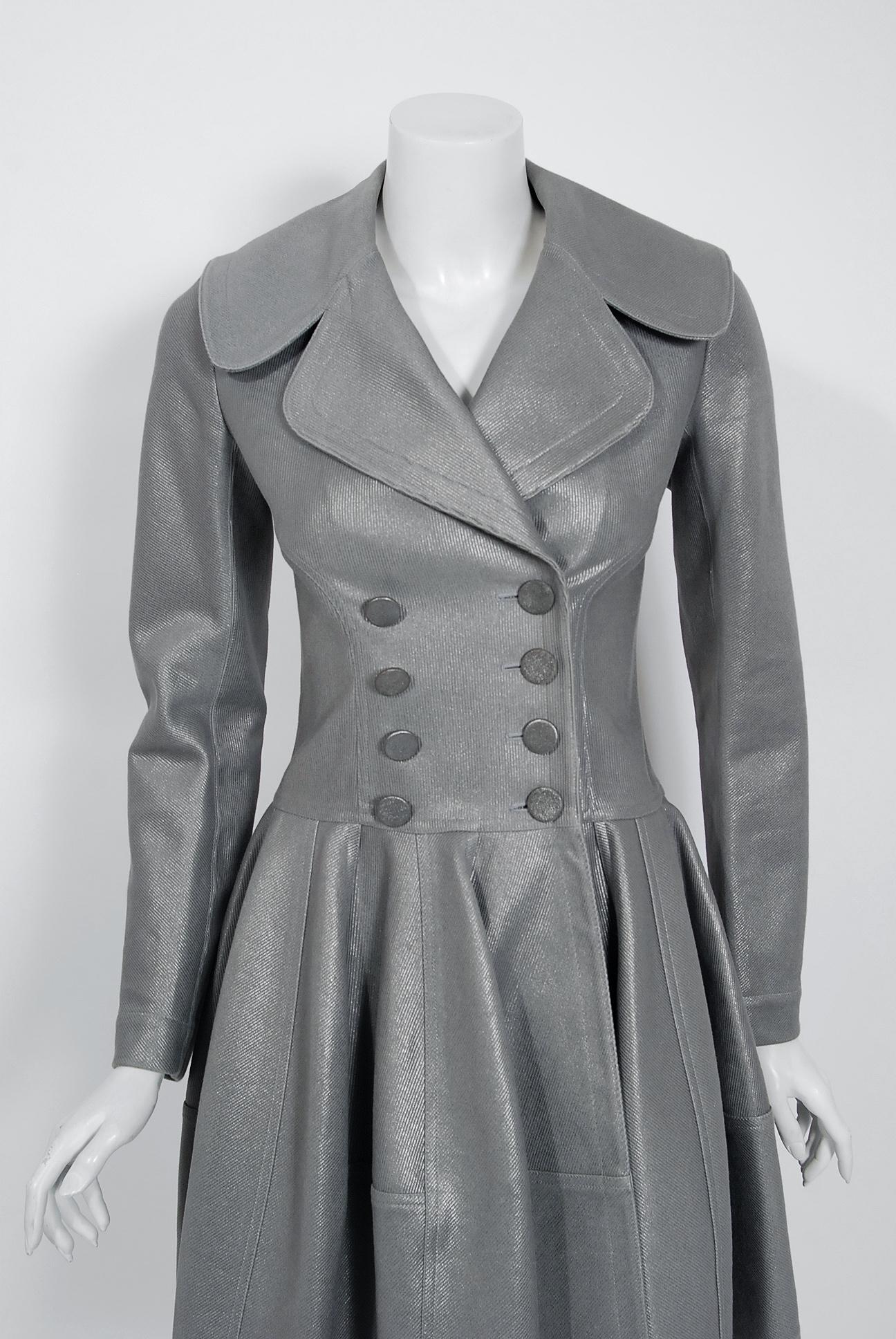 Fabulous 2005 Azzadine Alaia metallic-silver cotton blend coat featuring his signature full circle skirt design. This is definitely a stand-out piece with its eye-catching color and beautiful tailoring. As Suzy Menkes said, 