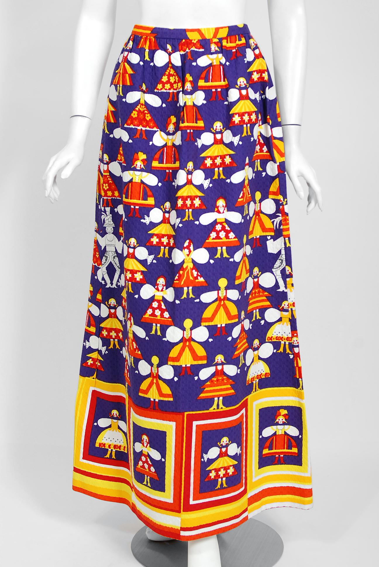 This adorable Lanvin Paris skirt, in the most stunning graphic novelty print textured pique cotton, is a statement piece. I love the vibrant colors and large scale paper dolls print. It manifests liveliness and makes you feel playful. Shaped with