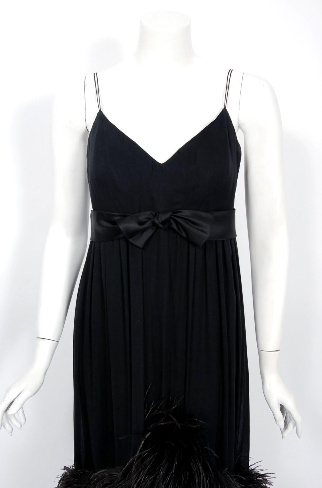 evening dress and stole of black feathers on black organza