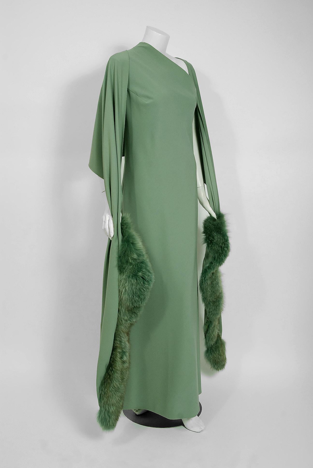 Exceptional Pauline Trigere designer seafoam green bias-cut gown dating back to the late 1960's During this time period, Pauline Trigère's name was part of the glamorous excess in Hollywood fashion. Her exquisite tailoring and feminine fitting