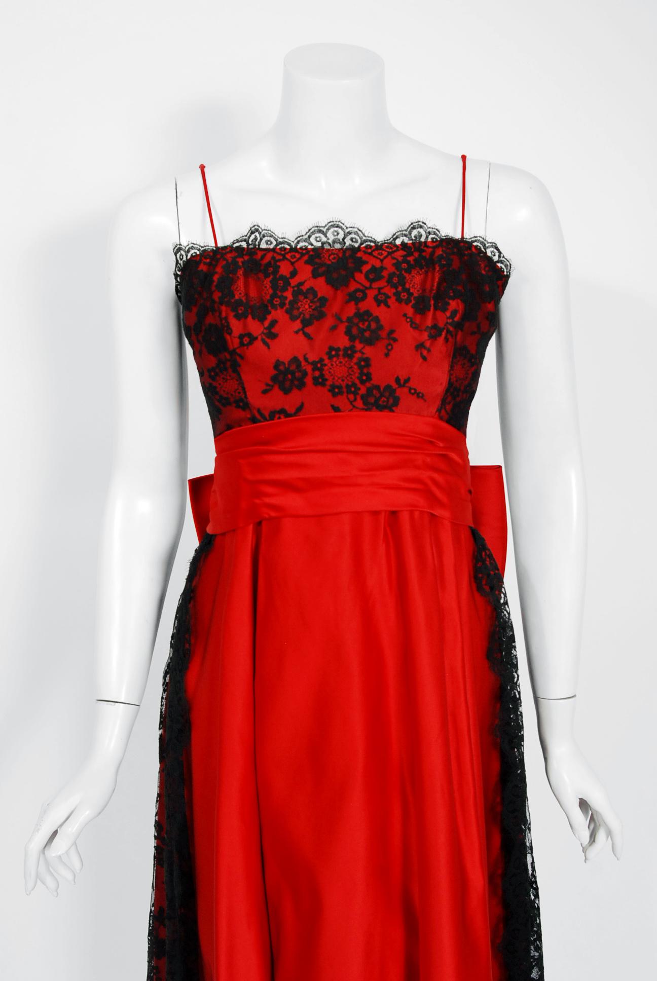 This is such a breathtaking and classic couture party dress from the iconic Ceil Chapman designer label. Perfect for any upcoming special event; you can't help but feel feminine in this beauty! The garment is fashioned from stunning mid-weight ruby