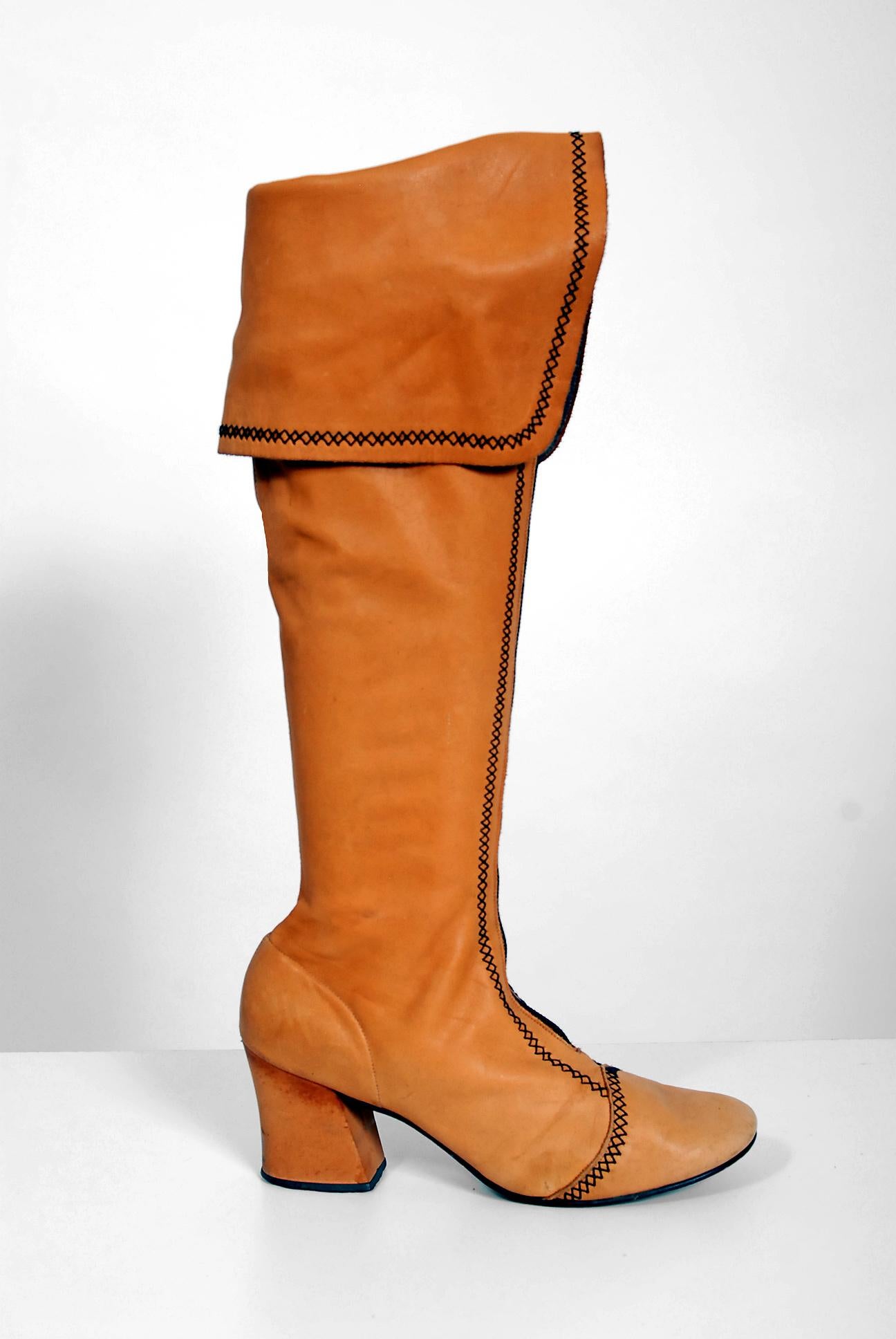 Sensational 1970's bohemian pirate boots in the most amazing wide-cuff style! The leather used is ultra-soft with unique embroidered trim throughout. I love the front zip-up construction and comfortable low heel. Many modern shoes are a complete