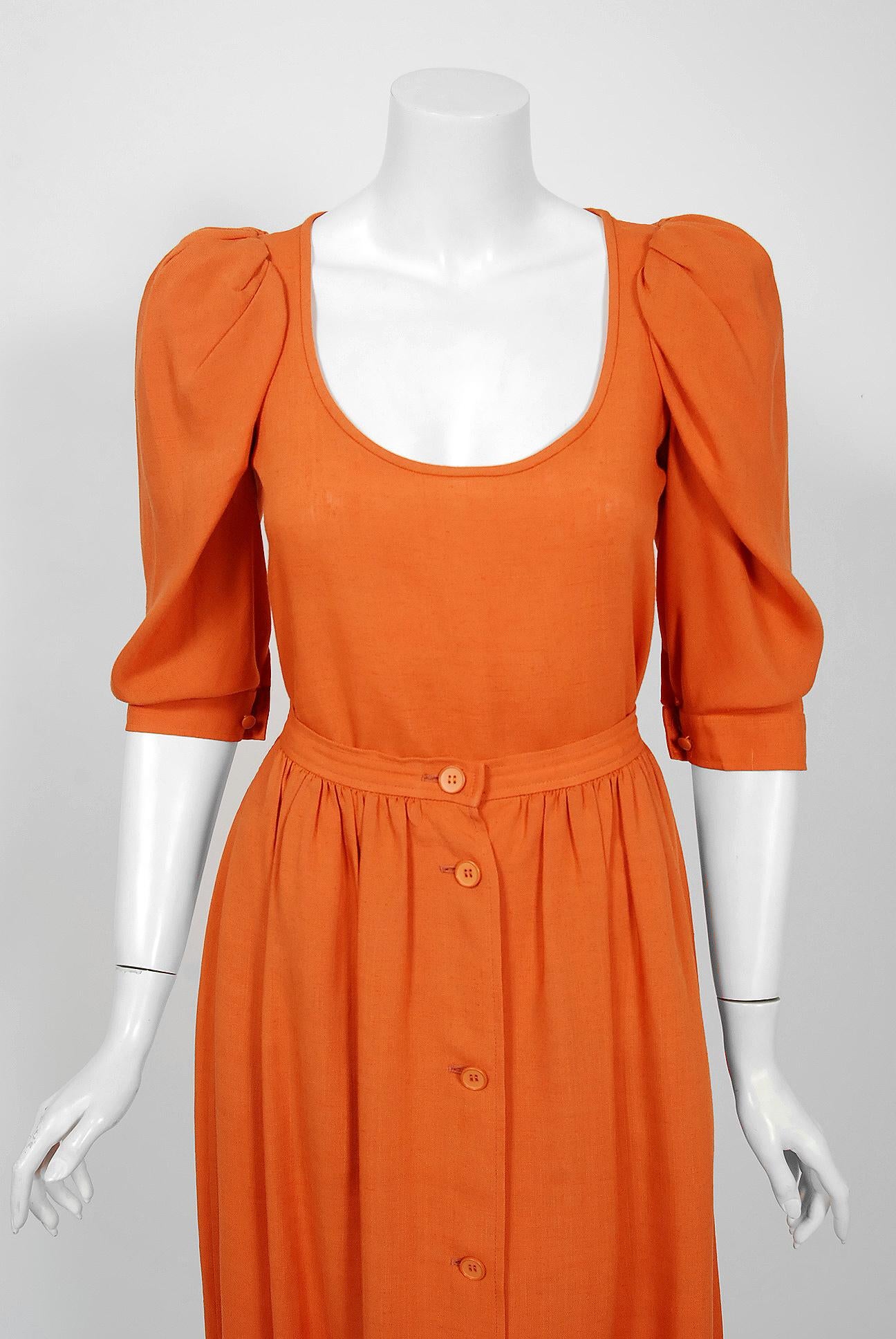 Gorgeous Yves Saint Laurent orange cotton-linen ensemble from the infamous 1978 Rive Gauche collection. Pieces from this decade are very rare and are true examples of fashion history. I adore the unique construction of the low-scoop sculpted