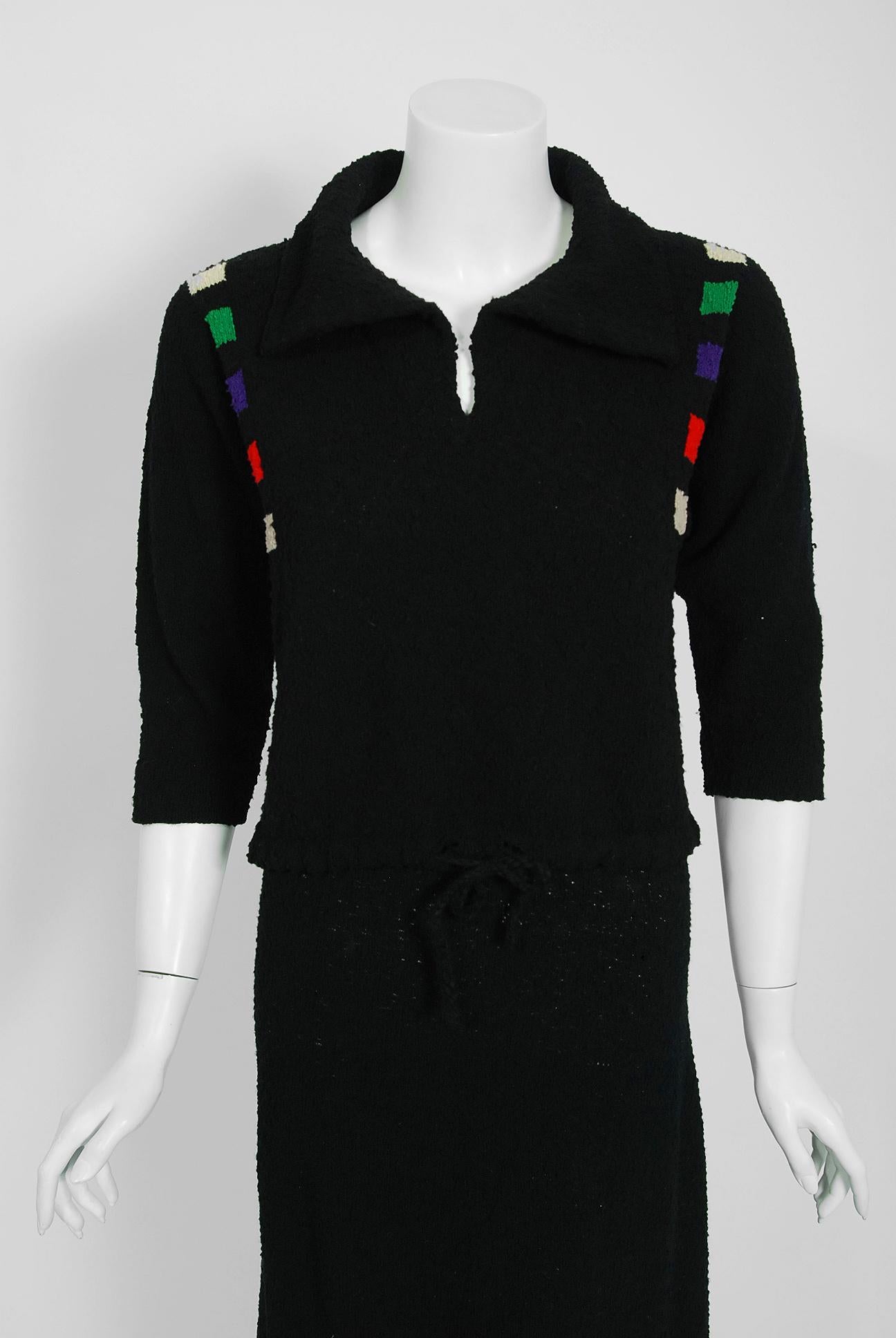 An alluring rainbow block-color deco motif boucle black wool-knit ensemble from the early 1940's Old Hollywood era of glamour. The beautiful sweater blouse has a flattering adjustable waist-tie for an extra nipped look. I love the collared plunge