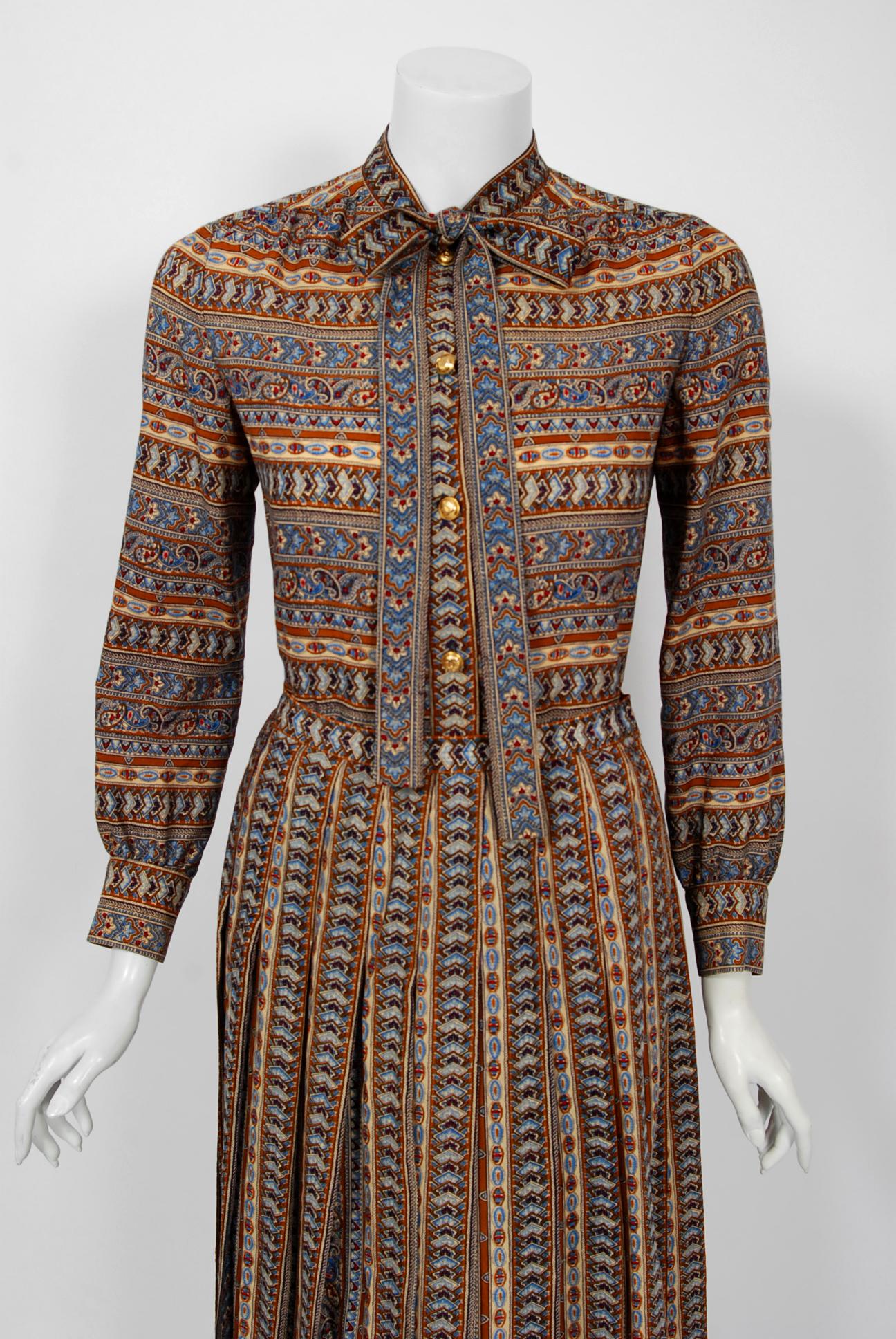 Chanel is known to be one of the most luxurious and decadent fashion houses in the world. This breathtaking blue brown paisley motif silk-wool blend ensemble from 1977 is a perfect example of why this couture brand has stood the test of time. Not