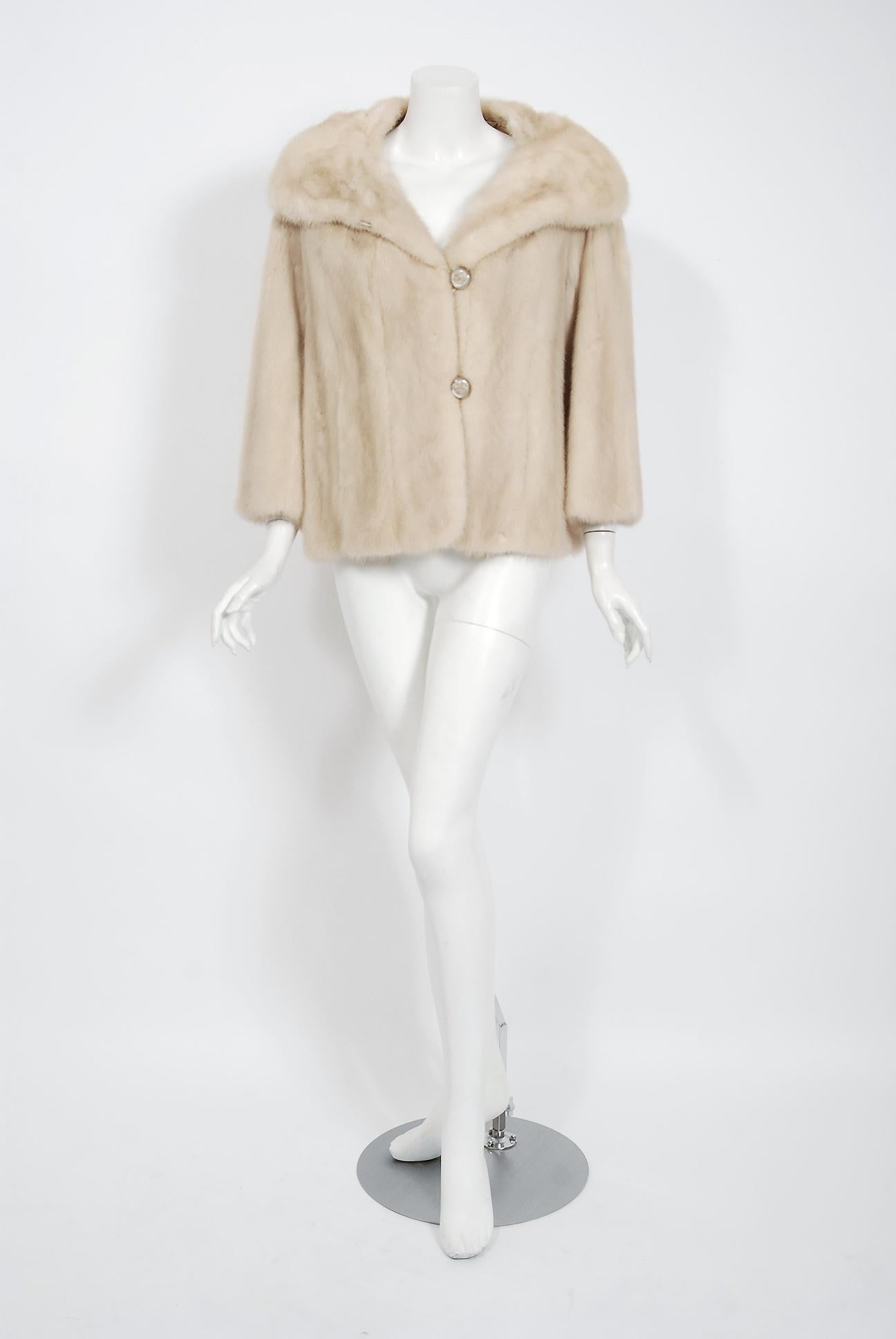 An extraordinary 1960's Adrian Thal Couture creme-beige mink fur jacket that will make any woman shine during the winter season! It is easy to see the level of quality in this rare piece; the fur is extremely supple and soft. The jacket is pieced