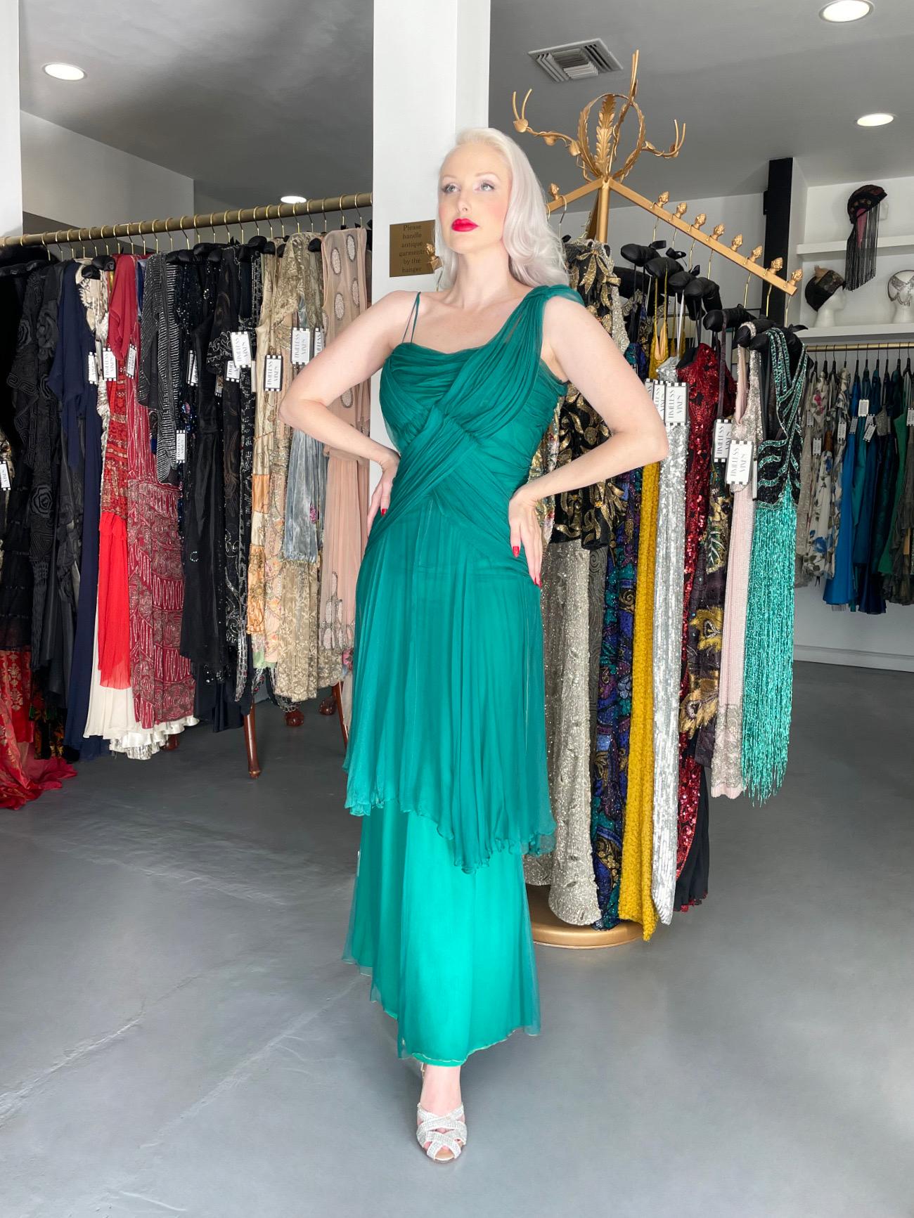 An incredibly ethereal and ultra rare Irene Lentz custom couture vibrant teal green  silk chiffon goddess gown dating back to her 1958 collection. Irene Lentz stunned the world in the 1930's, 40's and 50's with her ingeniously constructed,