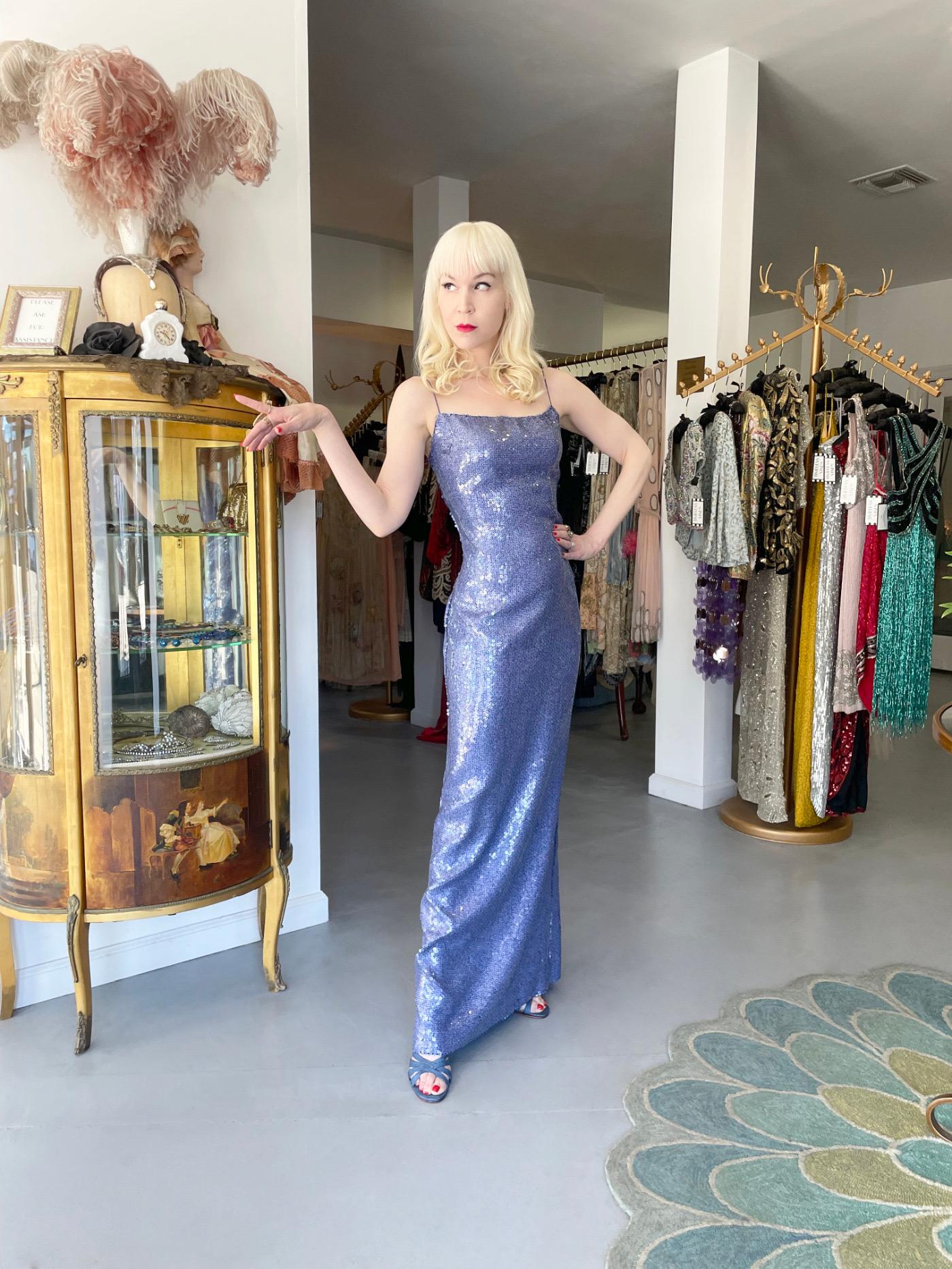 An incredibly chic and highly coveted Christian Dior fully sequin iridescent ocean blue silk bias-cut slip gown dating back to John Galliano's highly acclaimed 2000 fall-winter collection. Vogue stated about the collection, 