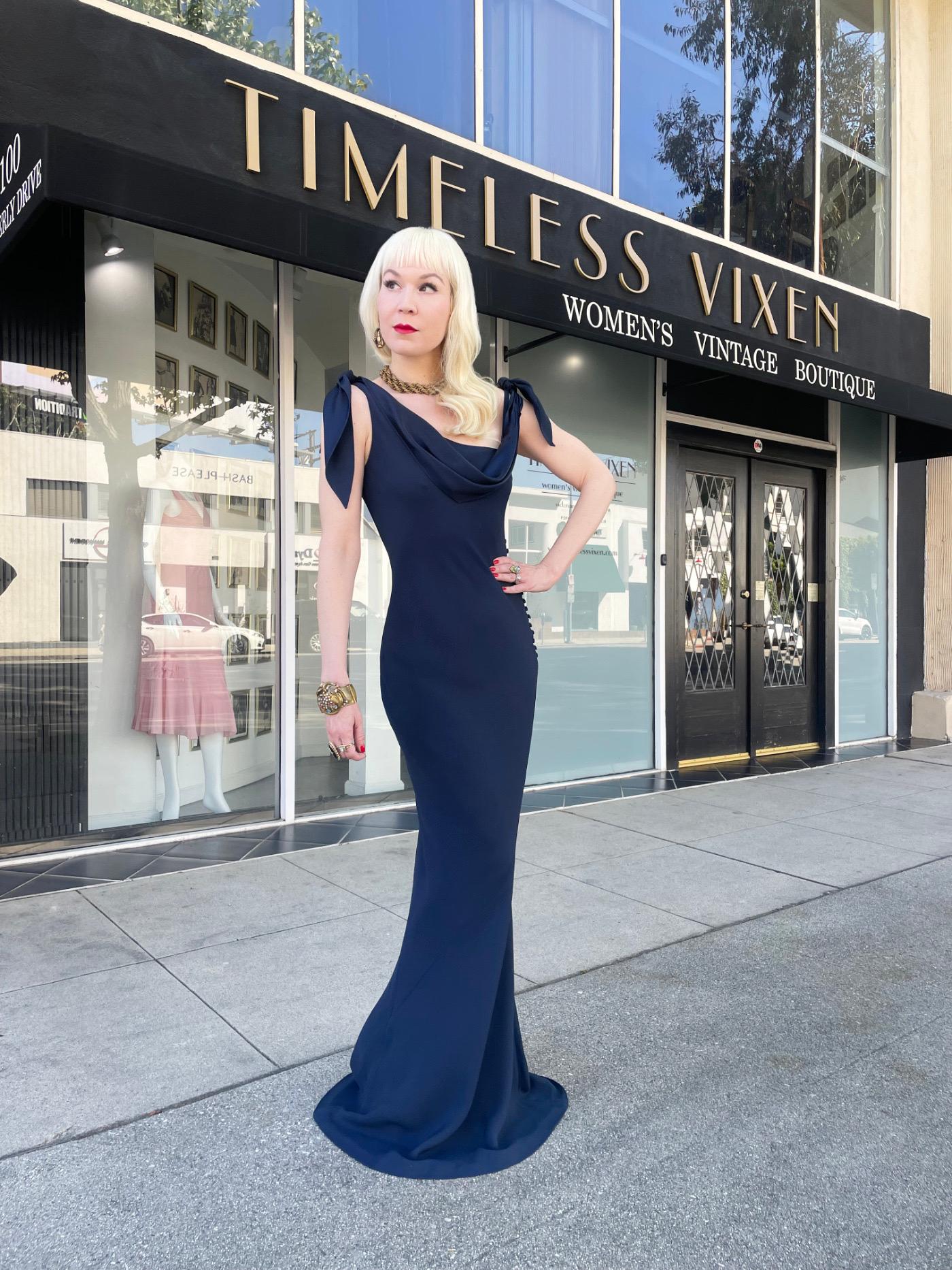 A totally breathtaking and highly coveted Christian Dior midnight navy blue silk bias-cut slip gown dating back to John Galliano's epic spring/summer 1998 collection. These early examples of his work are very collectable and are becoming incredibly