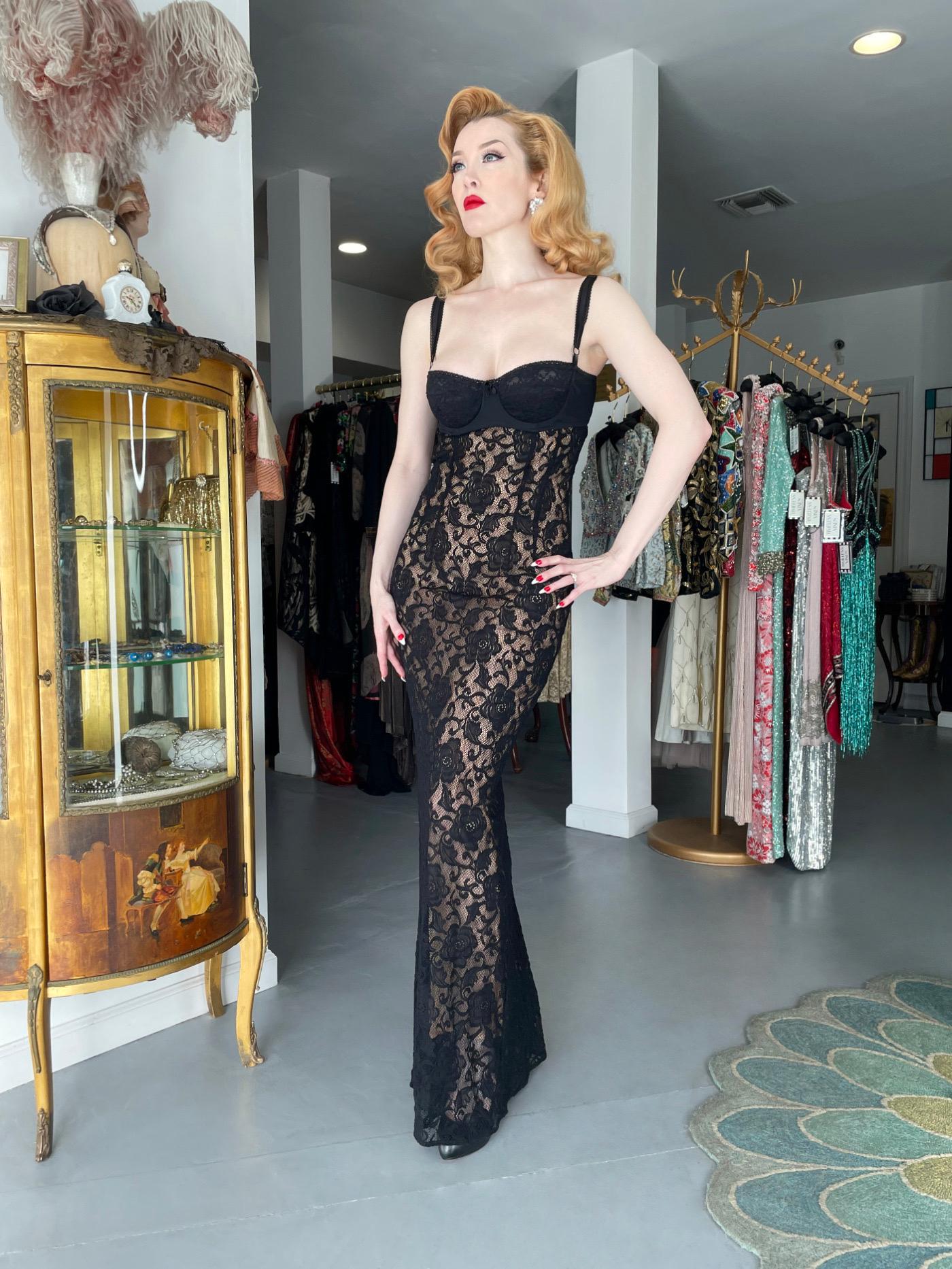 An instantly recognizable and ultra seductive Dolce & Gabbana sheer black stretch cotton-lace full length lingerie gown dating back to their coveted 1997 spring/summer collection. As pictured, Madonna wore a slip gown from the same collection when