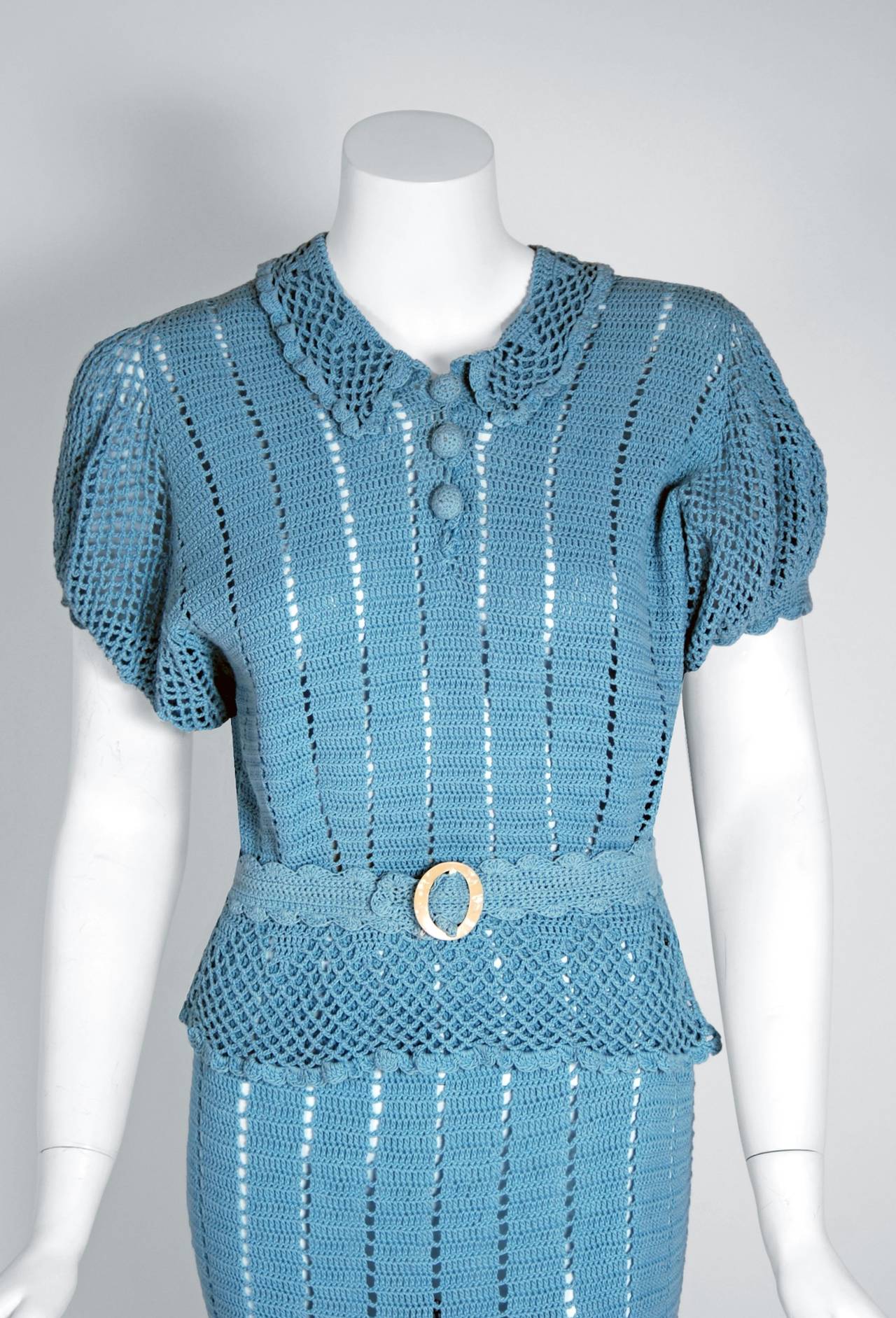An alluring baby-blue knit crochet ensemble from the 