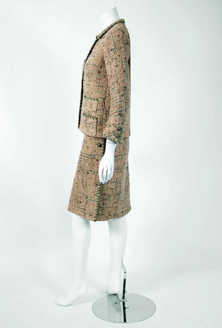 Chanel is known to be one of the most luxurious and decadent fashion houses in the world. This breathtaking ribbon-weave wool tweed two-piece suit from 1958 is a perfect example of why this couture brand has stood the test of time. Not only is this