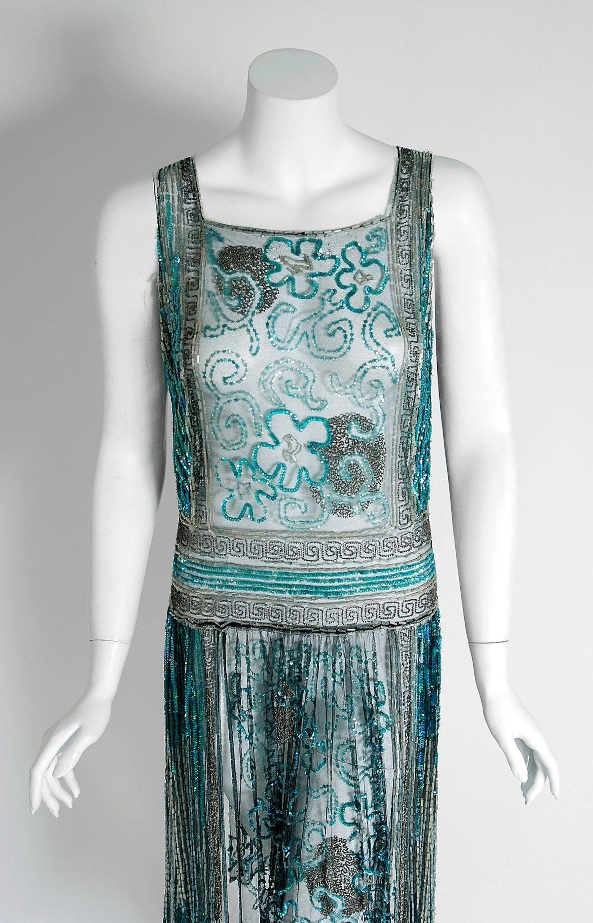 There are lots of lovely 1920's garments still around, but every once in a while I come across one that sets my heart a flutter! This is an extraordinarily beautiful and exceptional 1920's French museum quality sheer net-tulle dance dress.