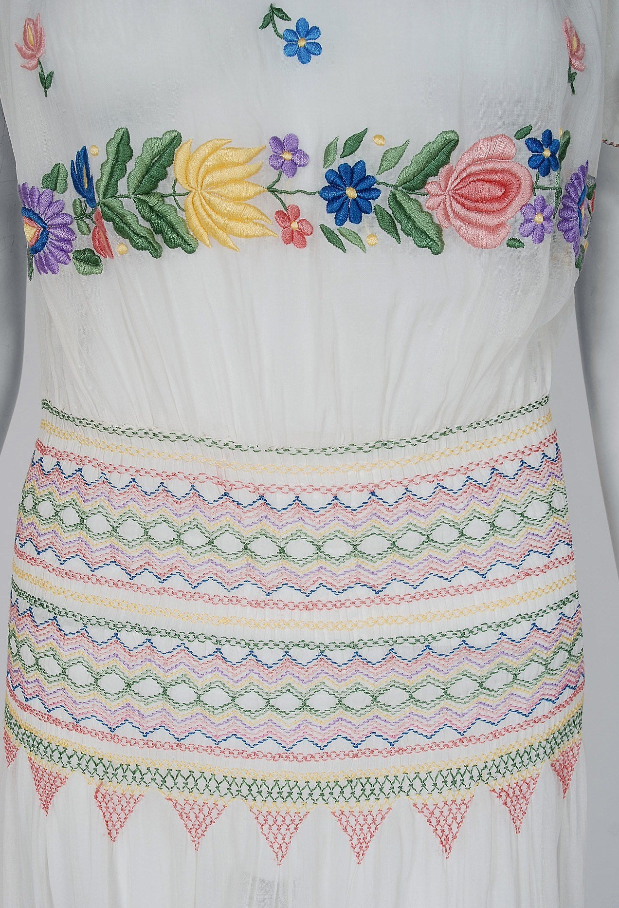 1920's Colorful Embroidered Floral White Cotton Flutter-Sleeve Smocked Day Dress In Excellent Condition In Beverly Hills, CA