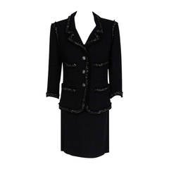 2008 Chanel Runway Black Boucle-Wool Pockets Fringe Trim Jacket Skirt Suit