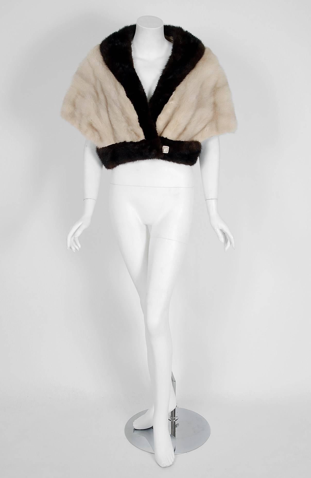 An extraordinary, ivory-white & chocolate-brown block color genuine mink-fur that will make any woman shine during the upcoming winter season! It is easy to see the level of quality in this piece; the fur is extremely supple and soft. The jacket is