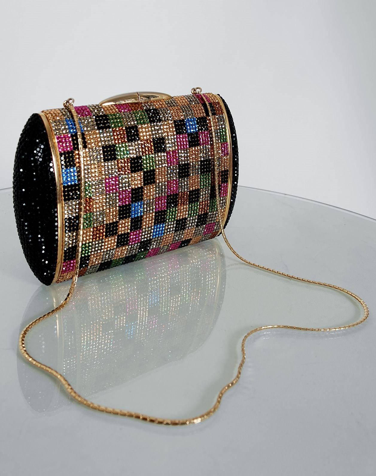 Breathtaking multi-colored deco squares crystal evening purse by the iconic American designer, Judith Leiber. Her creations are found in permanent collections at The Victoria and Albert Museum in London, The Metropolitan Museum of Art in New York,