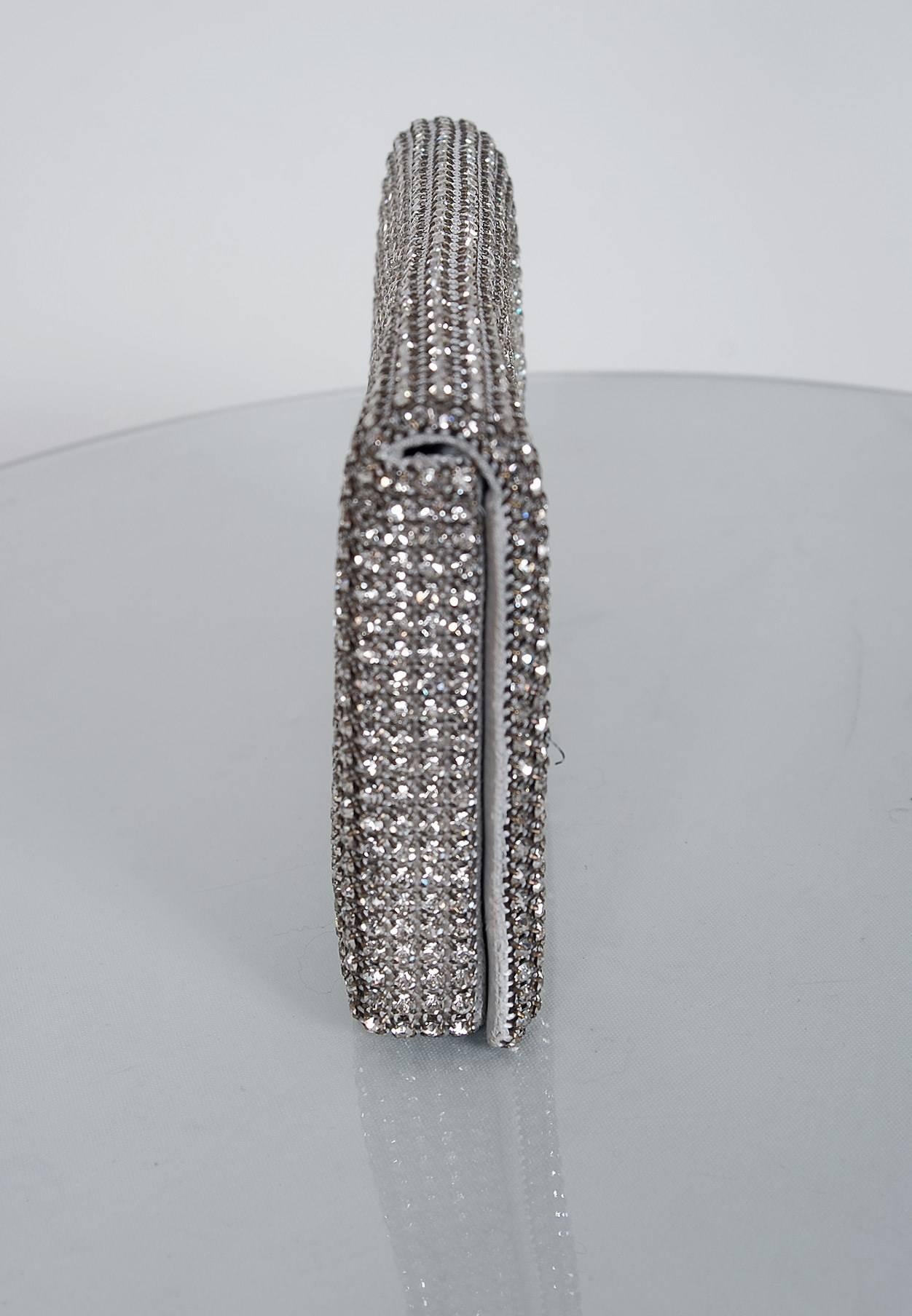 An extraordinary 1960's sparkling rhinestone clutch from the famous American designer, Mr. Blackwell. This elegant purse will make any woman shine during the upcoming holiday season. It is easy to see the level of quality in the piece. This beauty