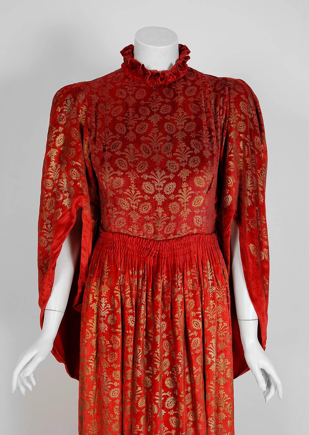 Breathtaking Maria Monaci Gallenga Couture trained gown dating back to the mid-1920's. The textile art of Gallenga is often compared to that of Mariano Fortuny because they both produced hand-stenciled designs that drew inspiration from the distant