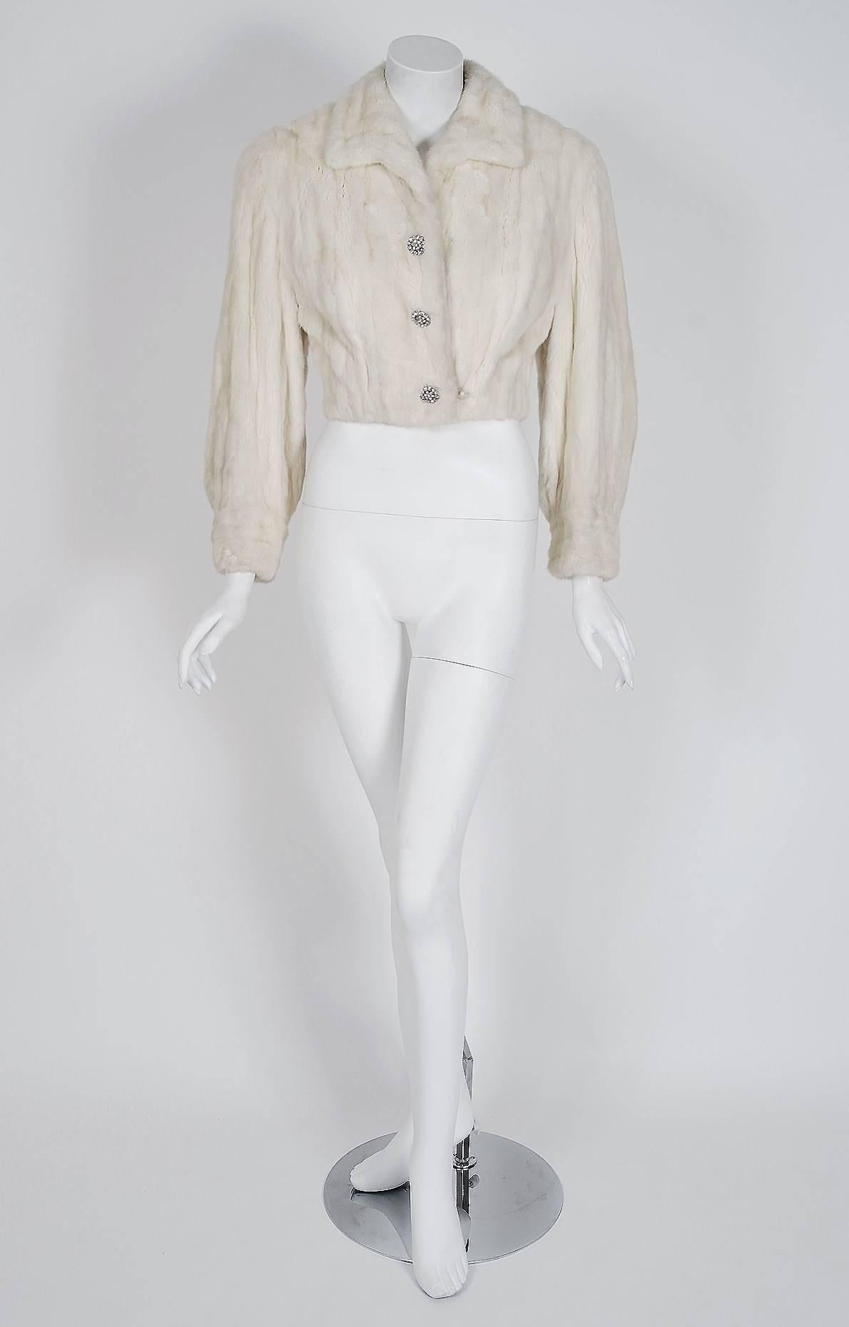A breathtaking, ivory-white colored genuine Ermine fur from the exclusive high-end New York boutique 