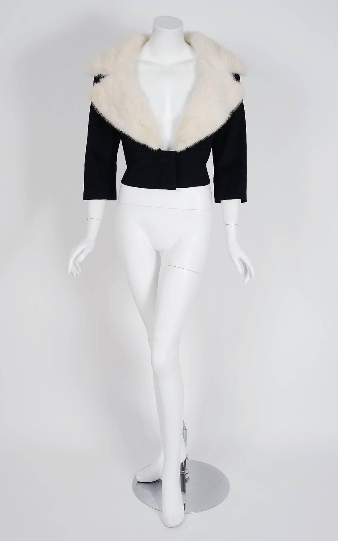 This Jean Patou ivory-white mink and black wool jacket, in the most beautiful silhouette, is pure couture perfection. Jean Patou's affinity for tailored design and elaborate materials is wonderful for the modern woman. Not only is this little number