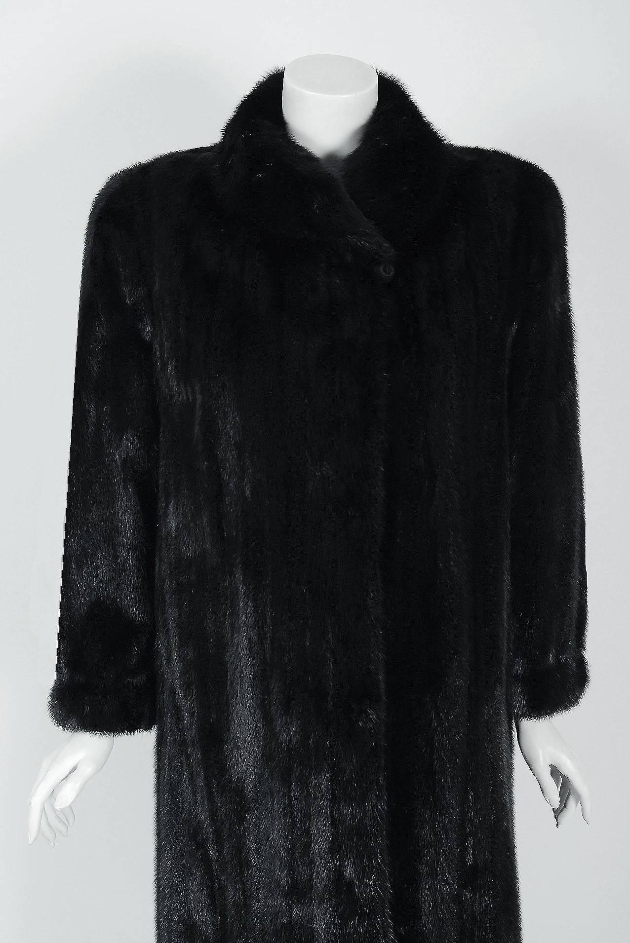 Breathtaking Christian Dior Couture genuine Black Diamond mink coat which originally retailed for over $20,000. The House of Dior has been an enduring icon of Haute Couture. When the talented Gianfranco Ferré took over as head designer in 1989, he