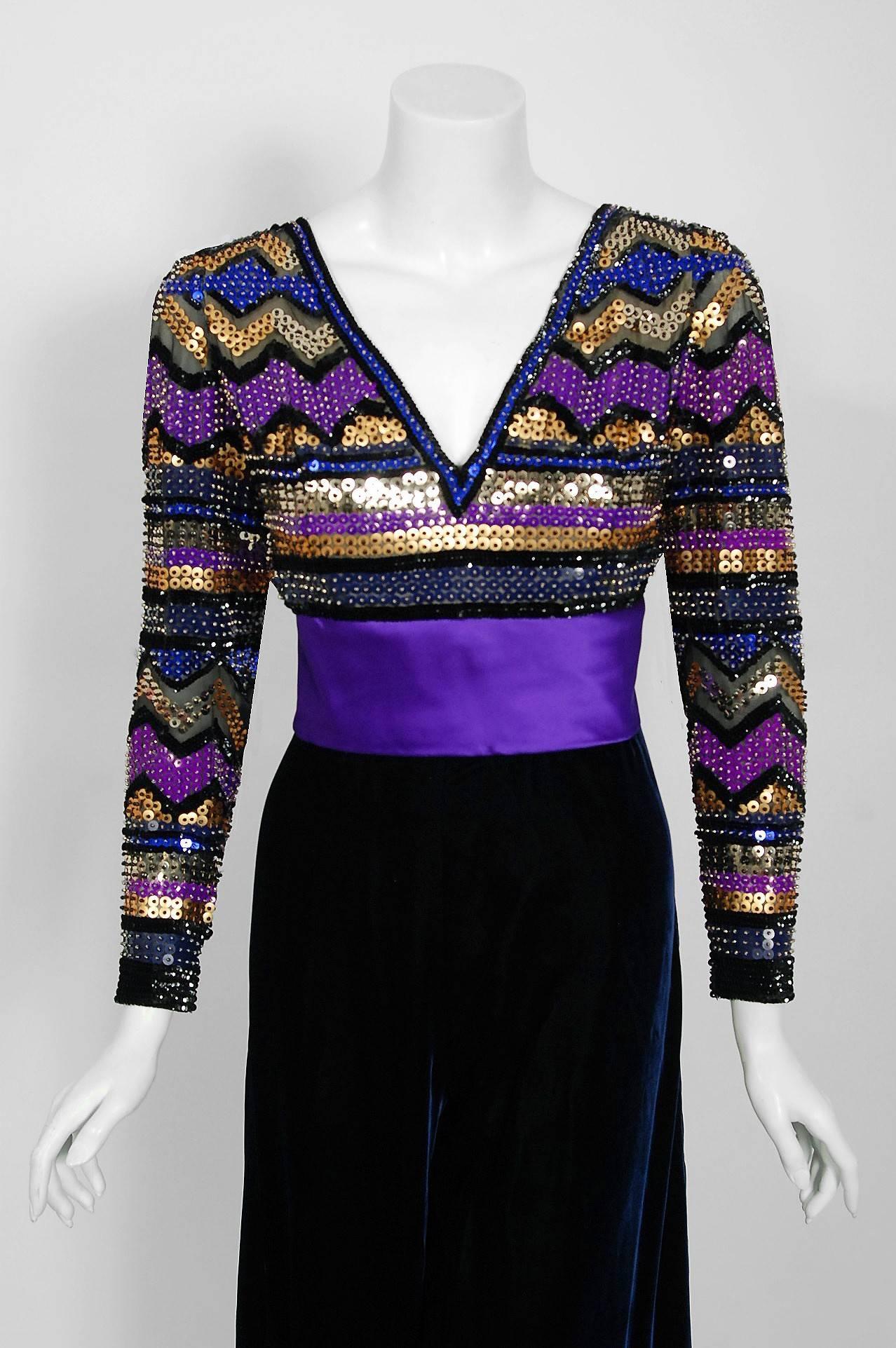 Exquisite Pierre Balmain Haute-Couture dark blue silk-velvet jumpsuit ensemble dating back to his opulent 1971 collection. This iconic designer created a very sculptural quality which was always allied with a ladylike essence. His garments have a