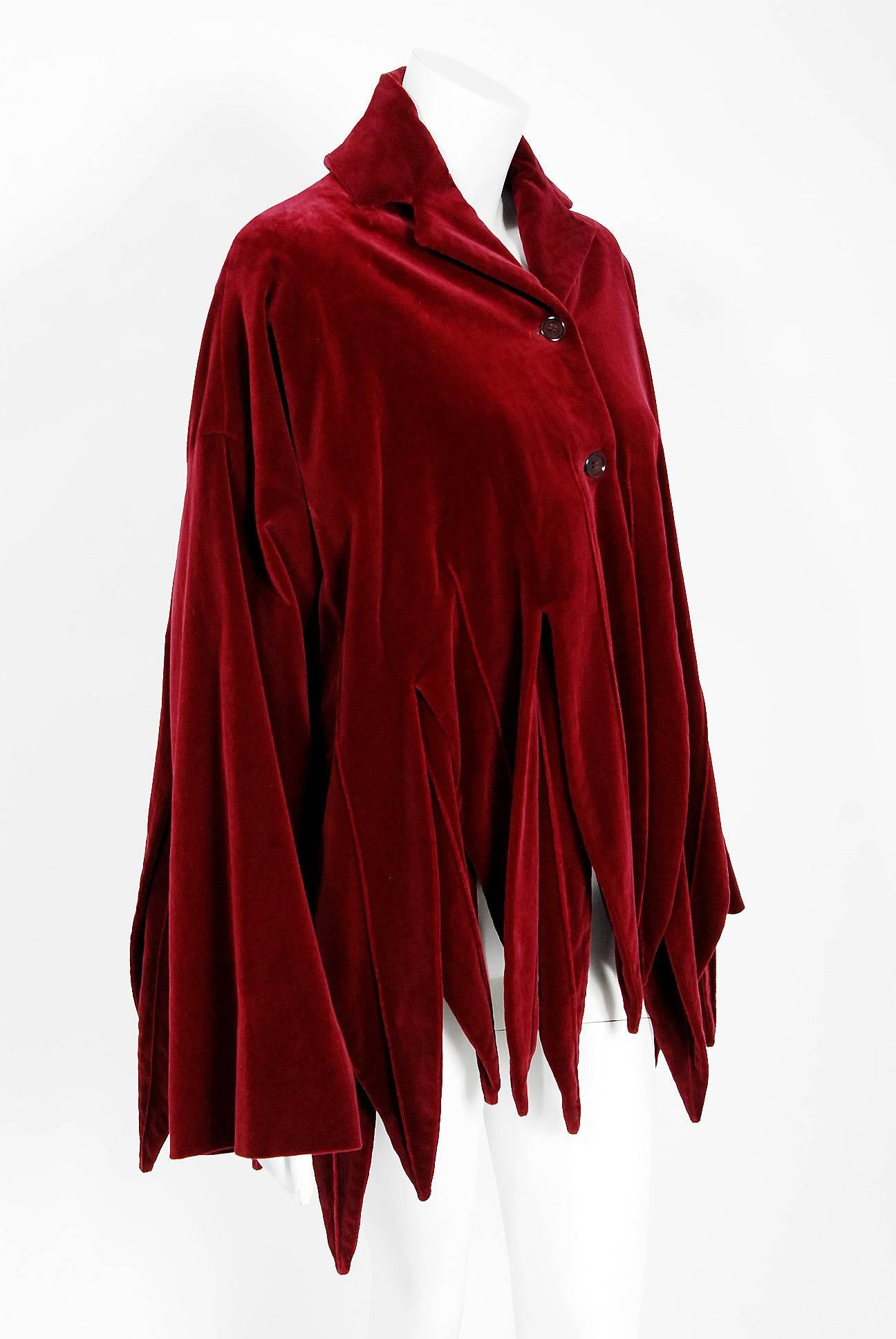 Breathtaking 1987 Romeo Gigli runway 'Jester' designer jacket in the most fabulous burgundy-red velvet. The twin version of this gorgeous piece is held in the permanent archives of The Metropolitan Museum. The construction is impeccable and has the