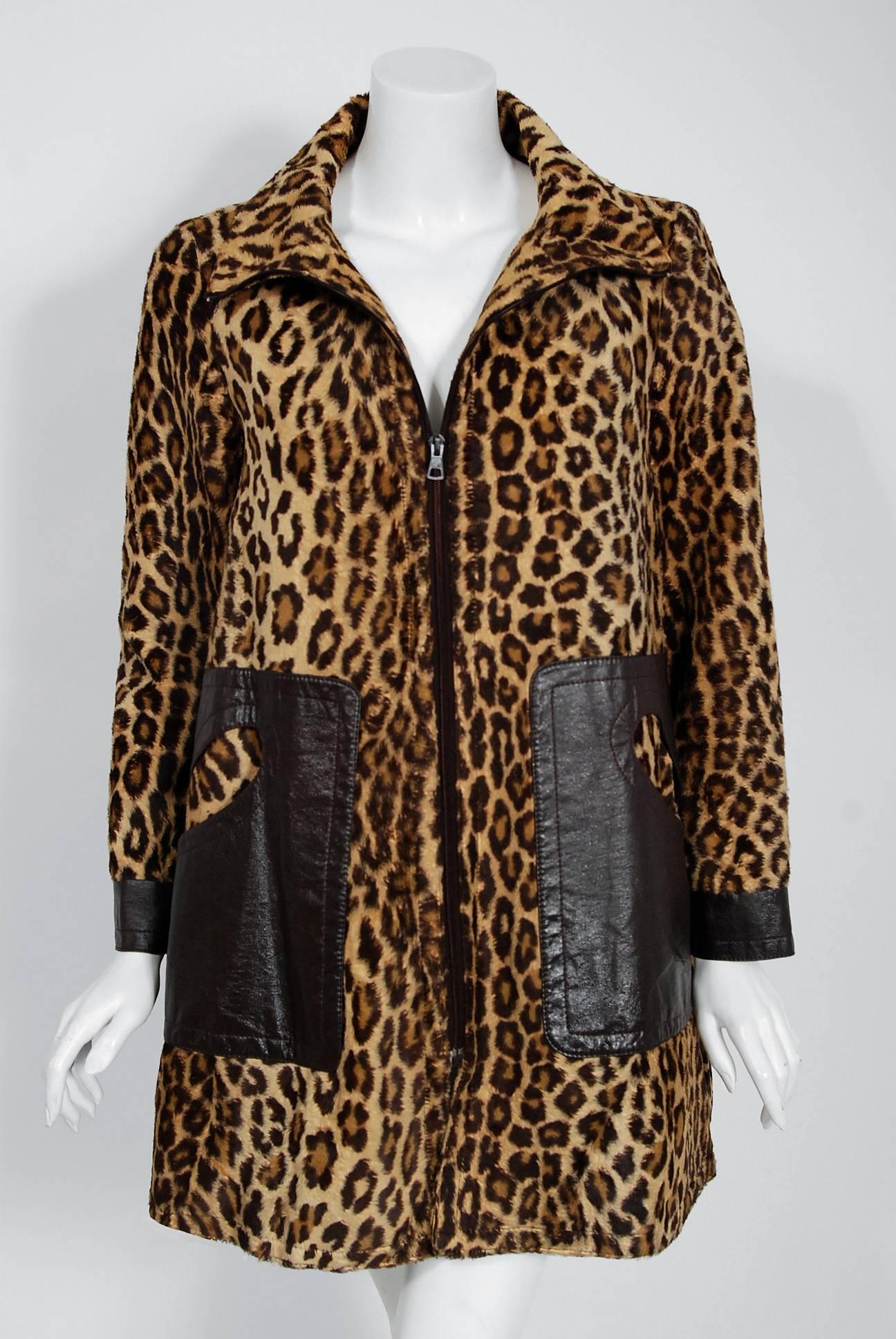 Marvelous 1968 Pierre Cardin designer jacket in a rich fully-lined leopard print faux-fur. In 1951 Cardin opened his own couture house and by 1957, he started a ready-to-wear line; a bold move for a French couturier at the time. The look most